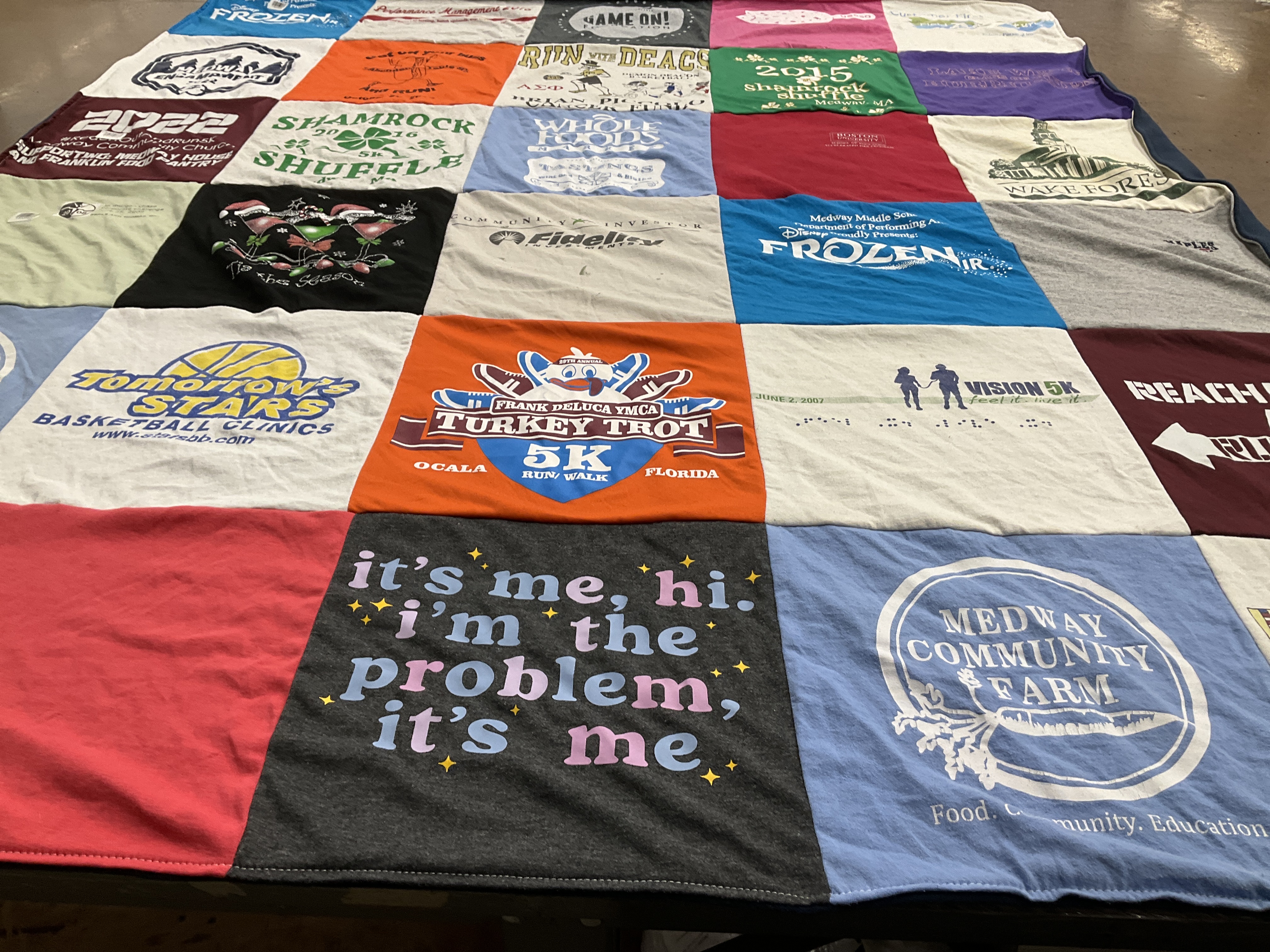 T-shirt quilt with running, basketball themes by Ellen from MA