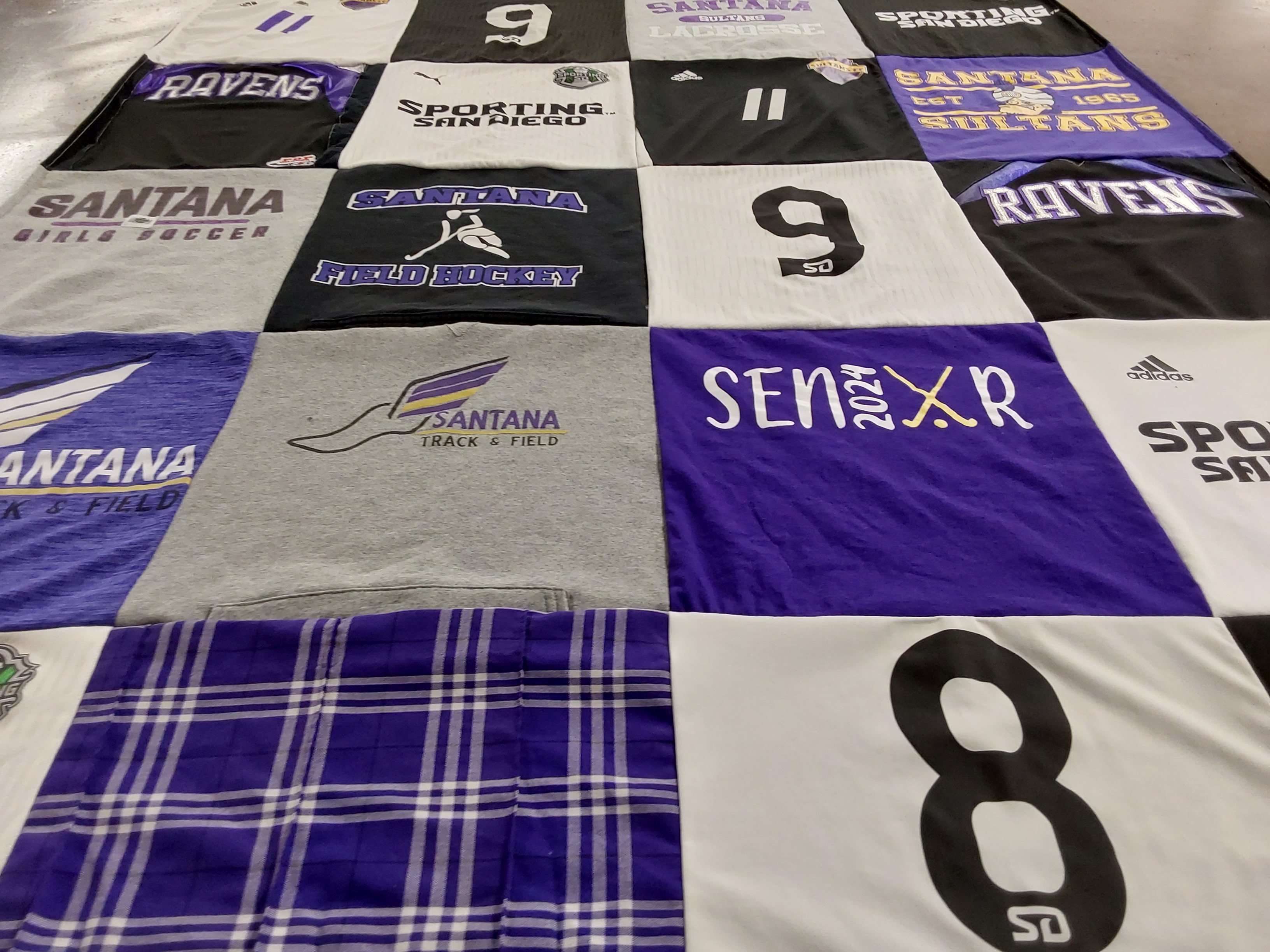 T-shirt quilt featuring santana high school ravens, santana high school track and field by Brianna from CA