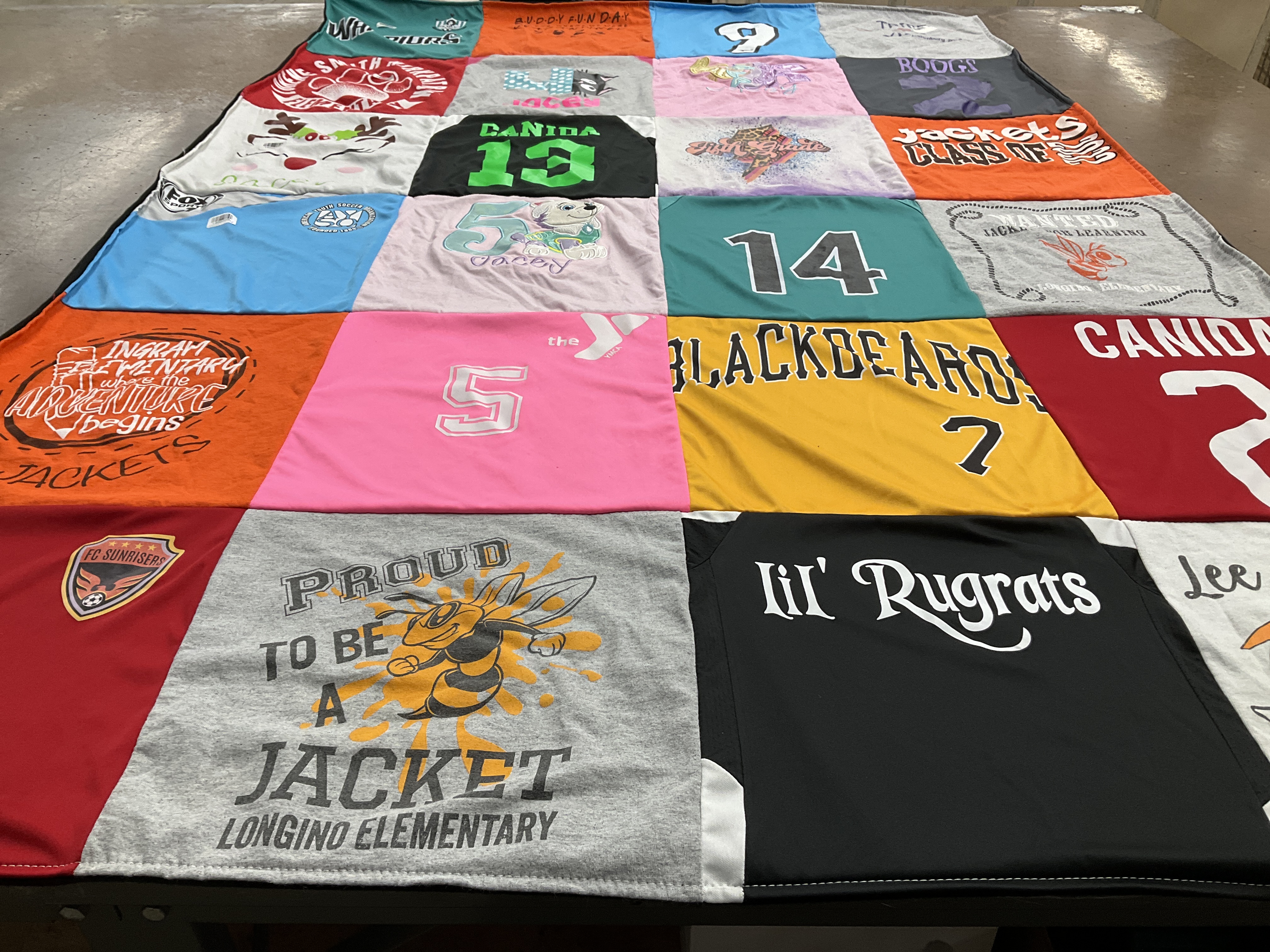 T-shirt quilt featuring longino elementary jackets, longino elementary blackdears by Jaime from TX