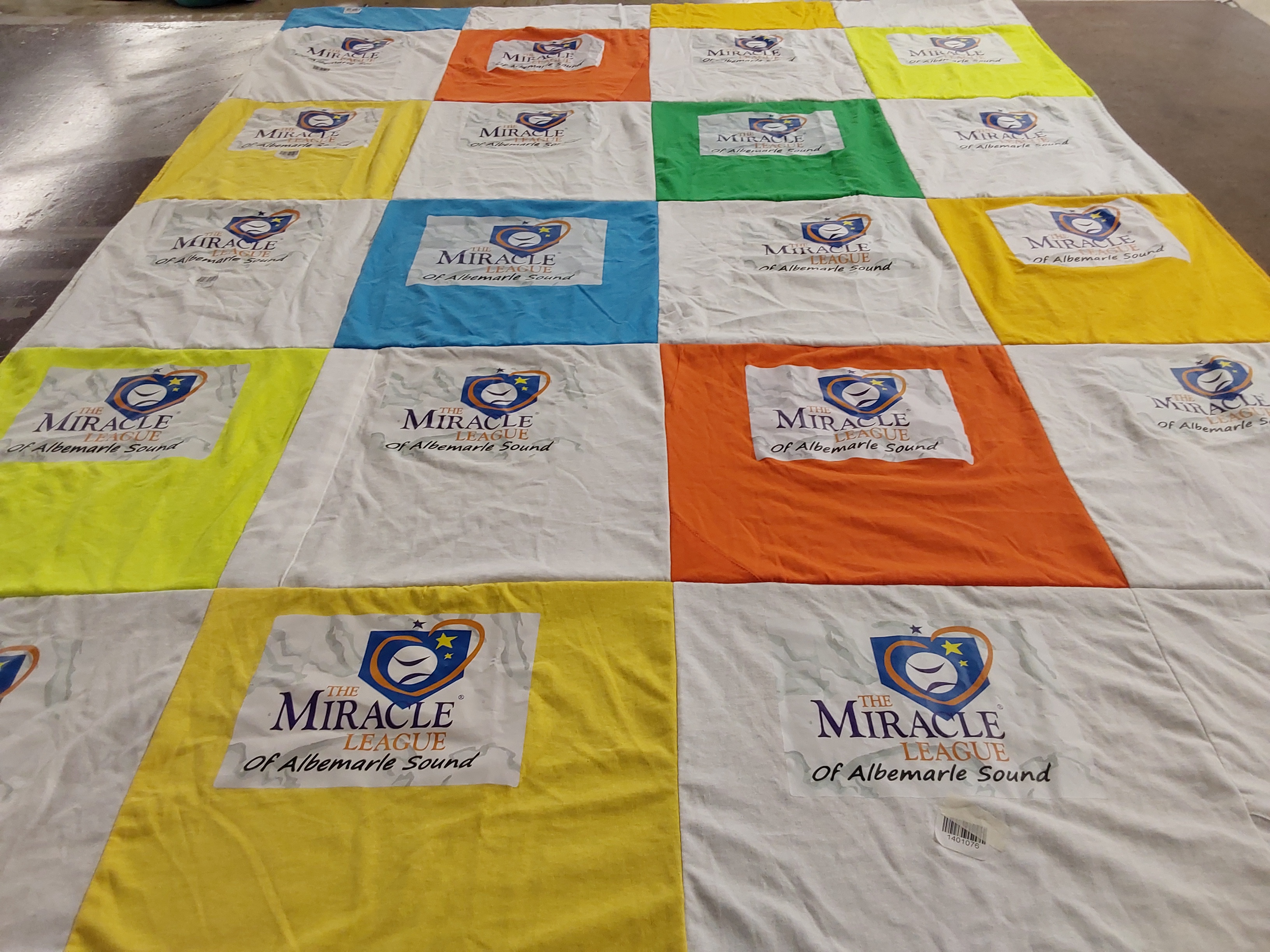 T-shirt quilt with community support, sports for disabled themes by Becky from NC