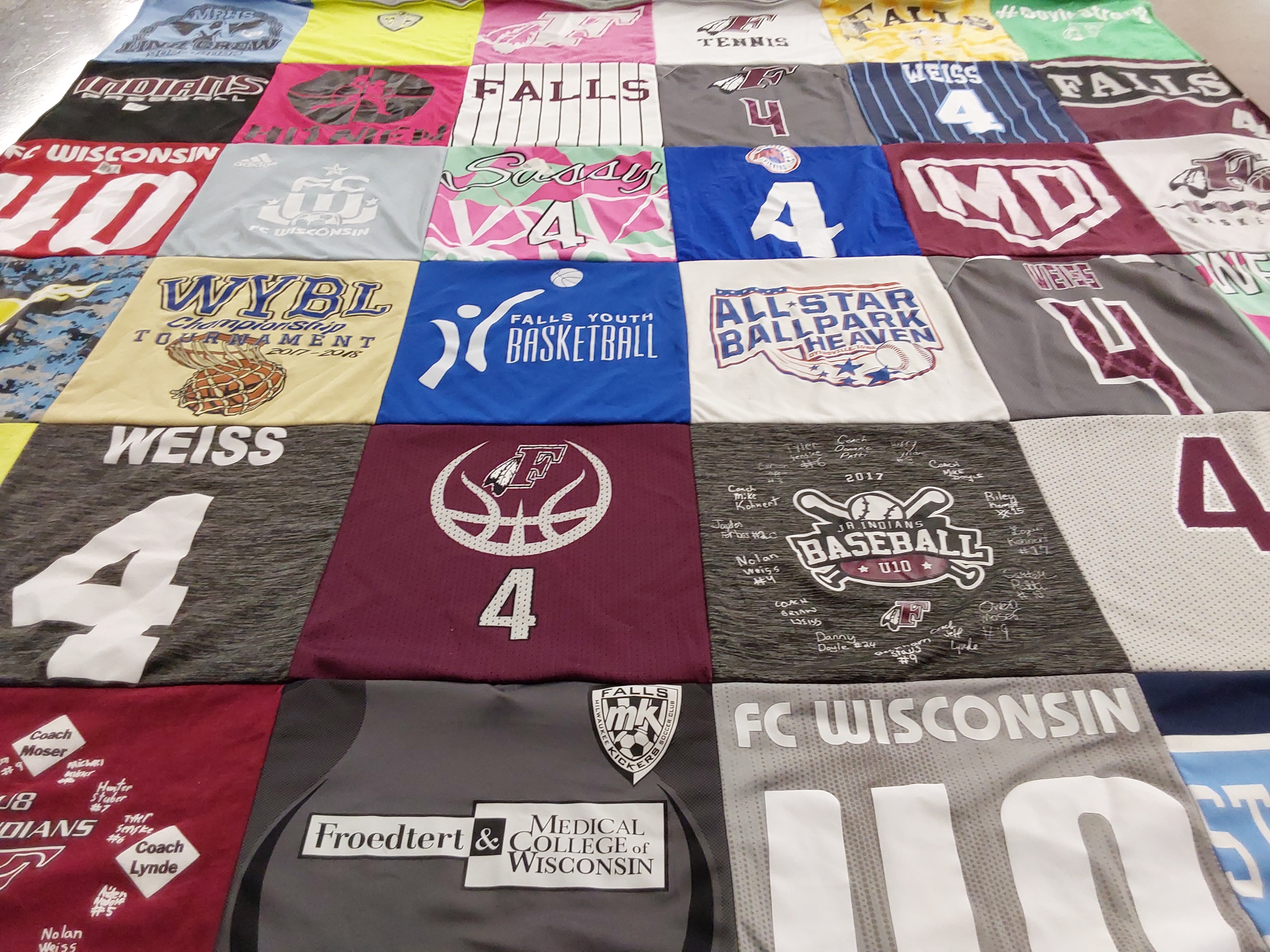 T-shirt quilt featuring junior indians, falls basketball team by Holly from WI
