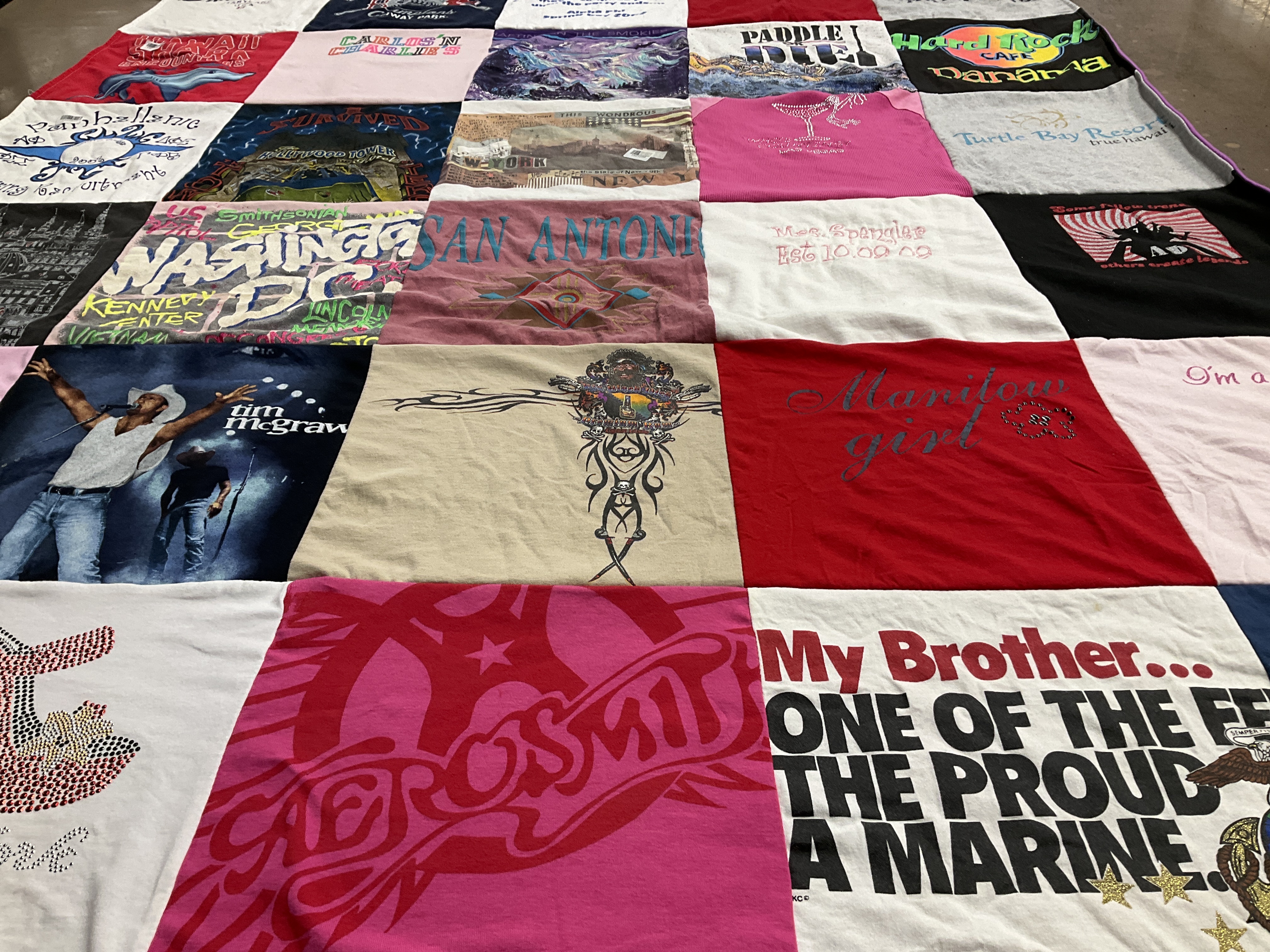 T-shirt quilt with country music, concerts themes by Suzanne from TX