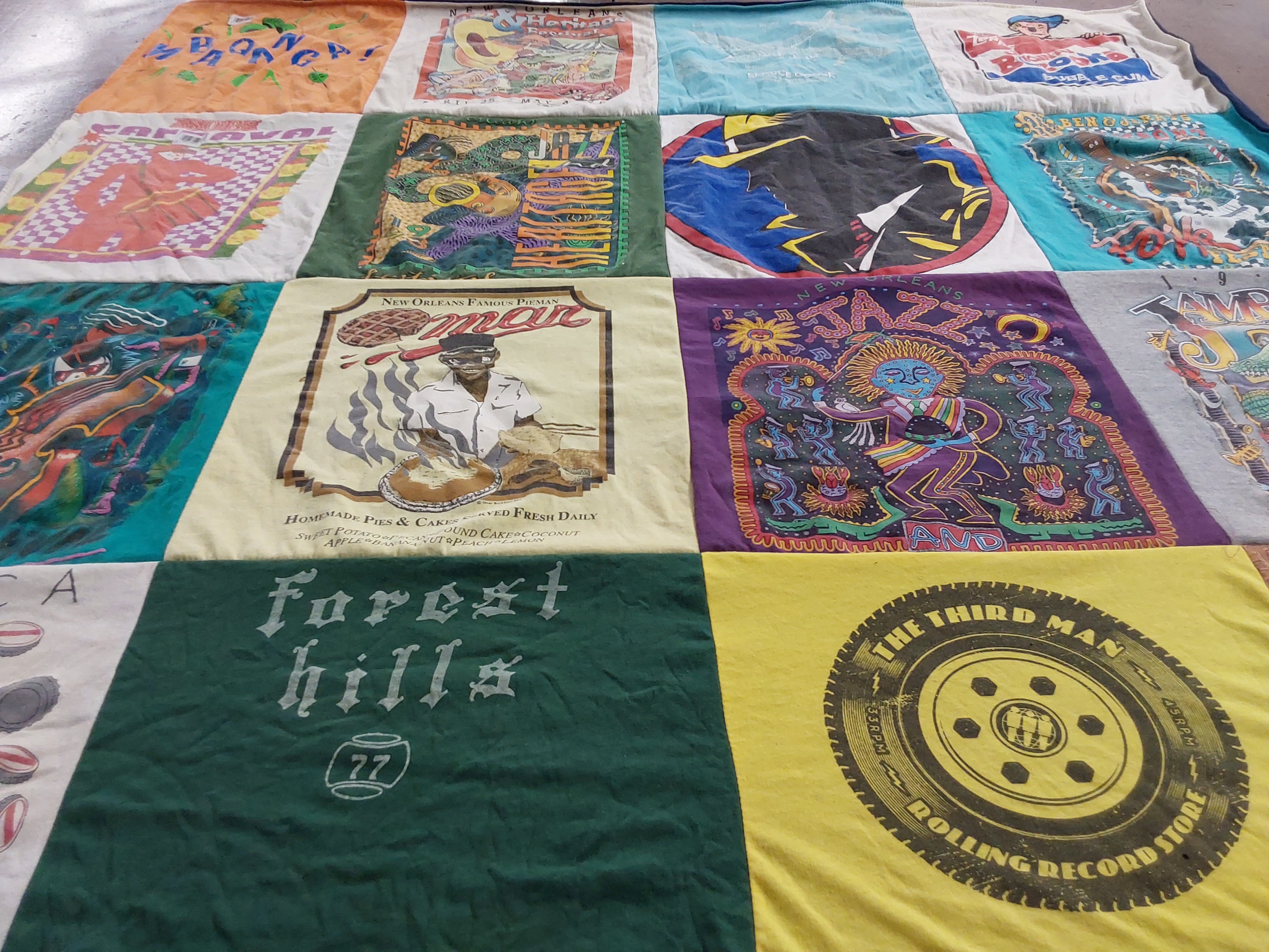 T-shirt quilt with music, cooking themes by Deborah from NY
