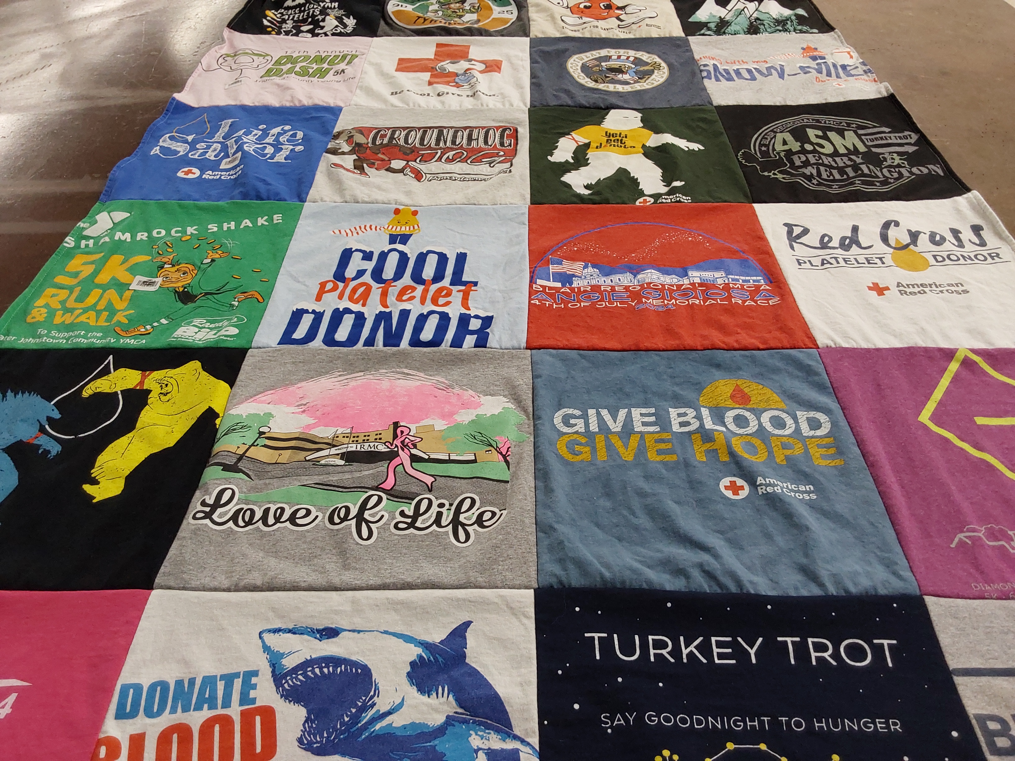 T-shirt quilt with running, donating themes by Michael from PA