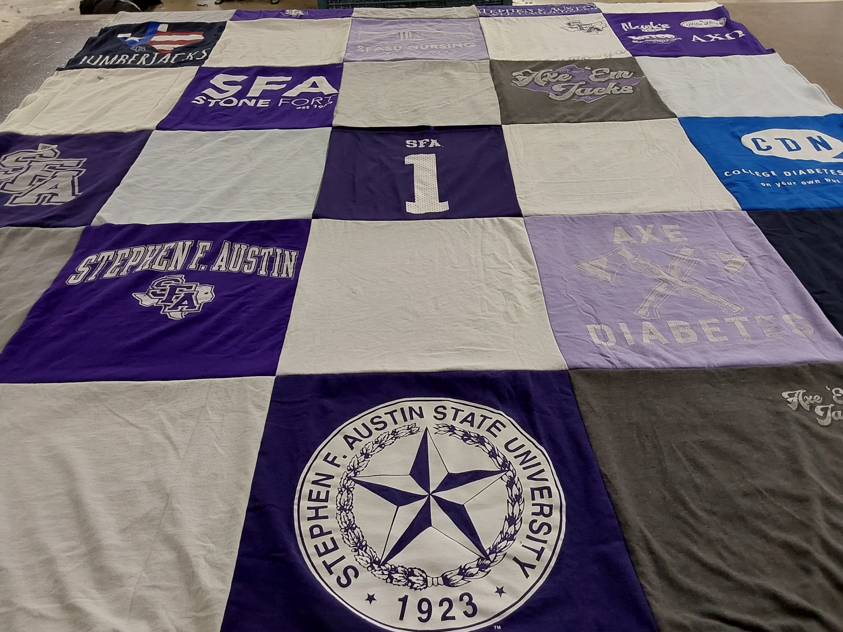 T-shirt quilt featuring stephen f austin lumberjacks by Mikayla from NE