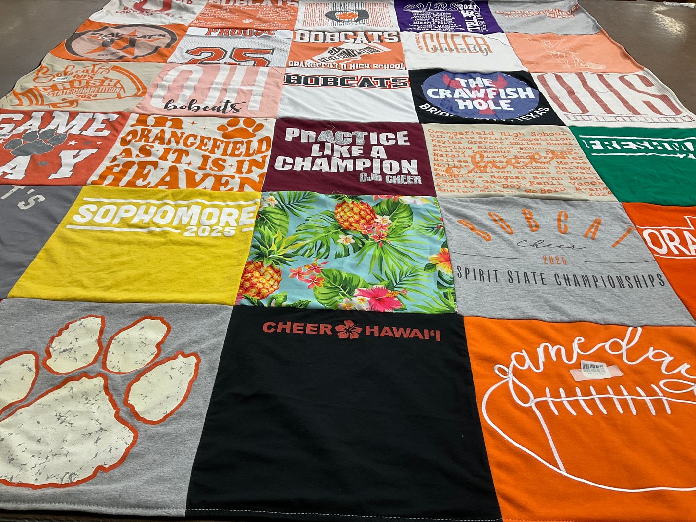 T-shirt quilt featuring bobcat cheer team by Tabitha from TX