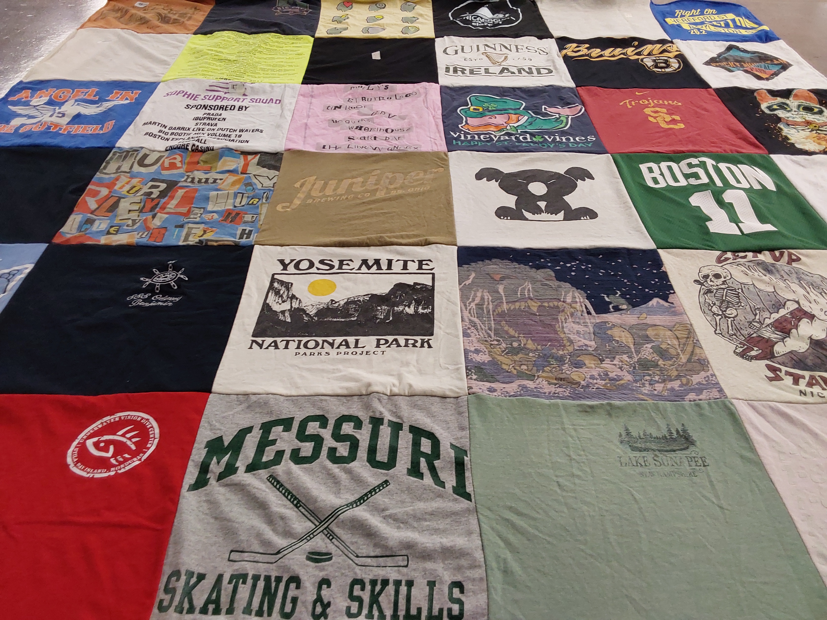 T-shirt quilt with nature, beer brewing themes by Anna from MA