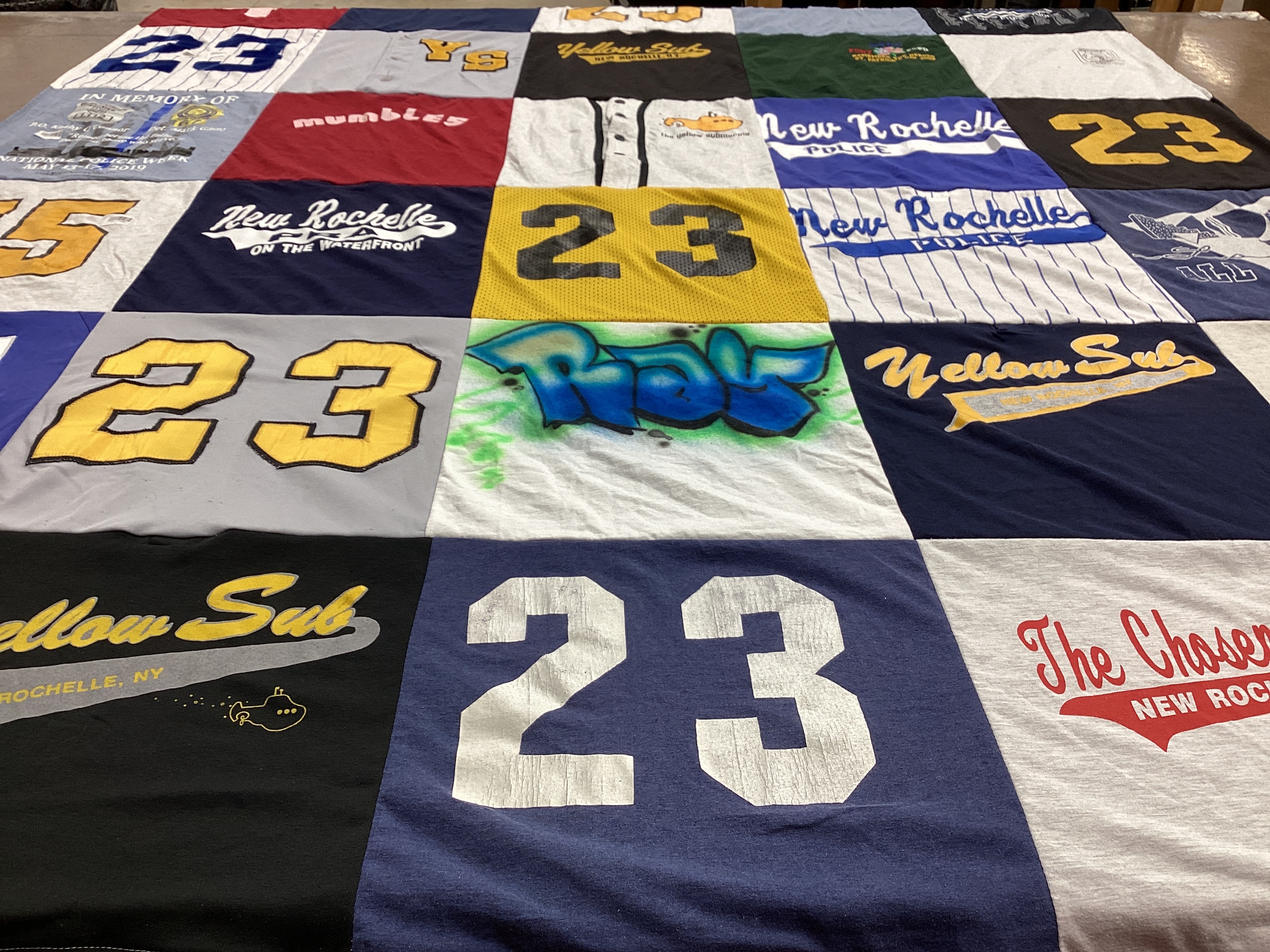 T-shirt quilt with sports, local culture themes by Raymond from NY