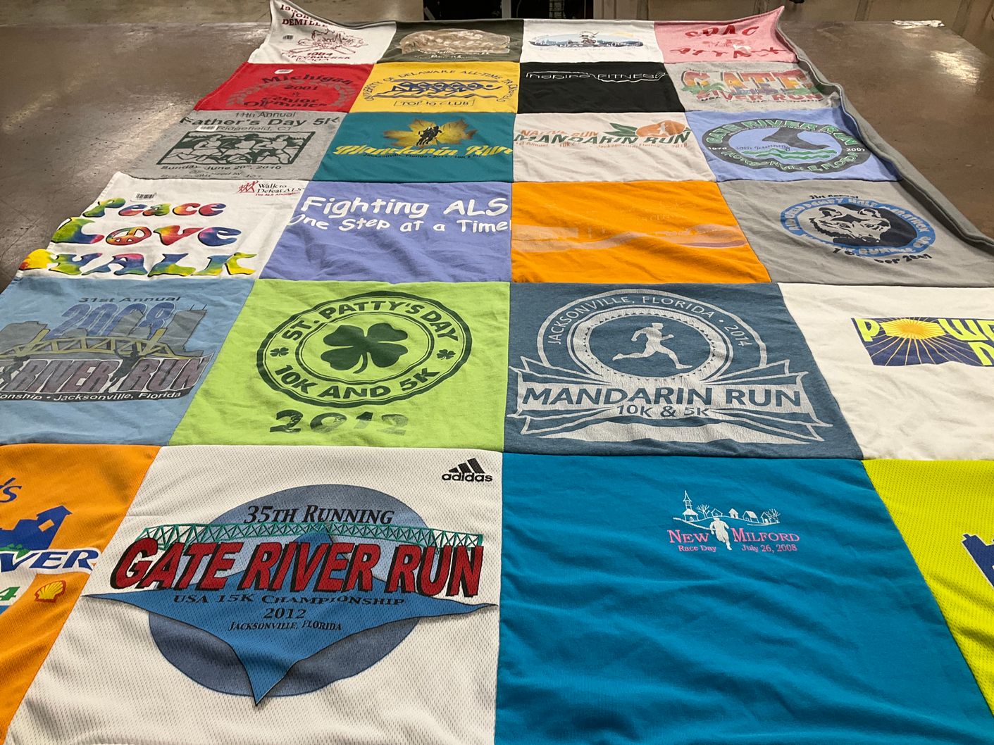 T-shirt quilt with running, charity themes by Loretta from CT