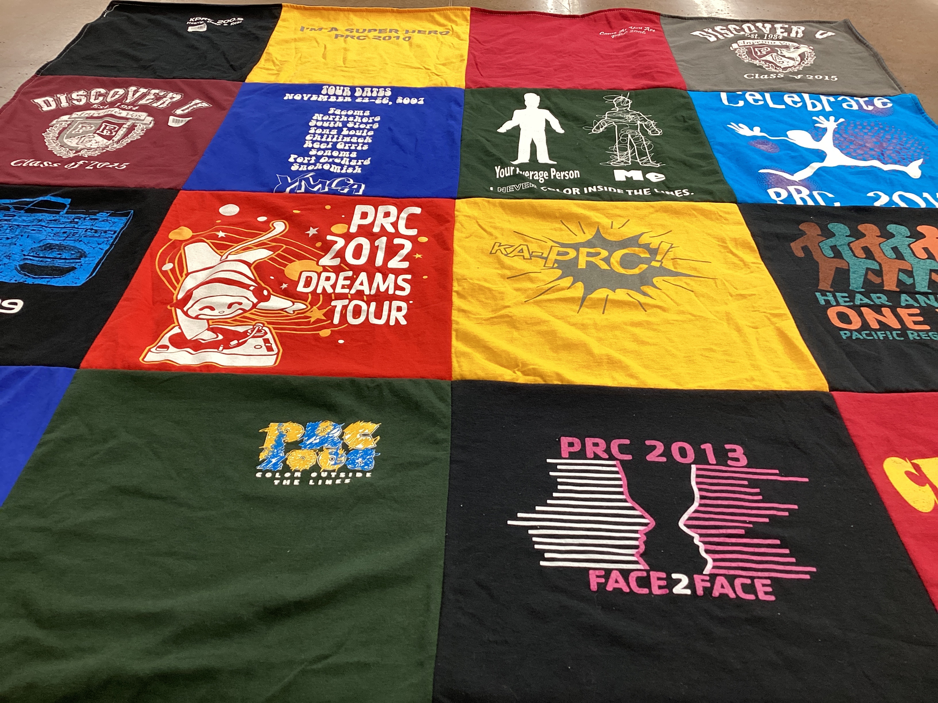 T-shirt quilt with events, celebrations themes by Jane from NC