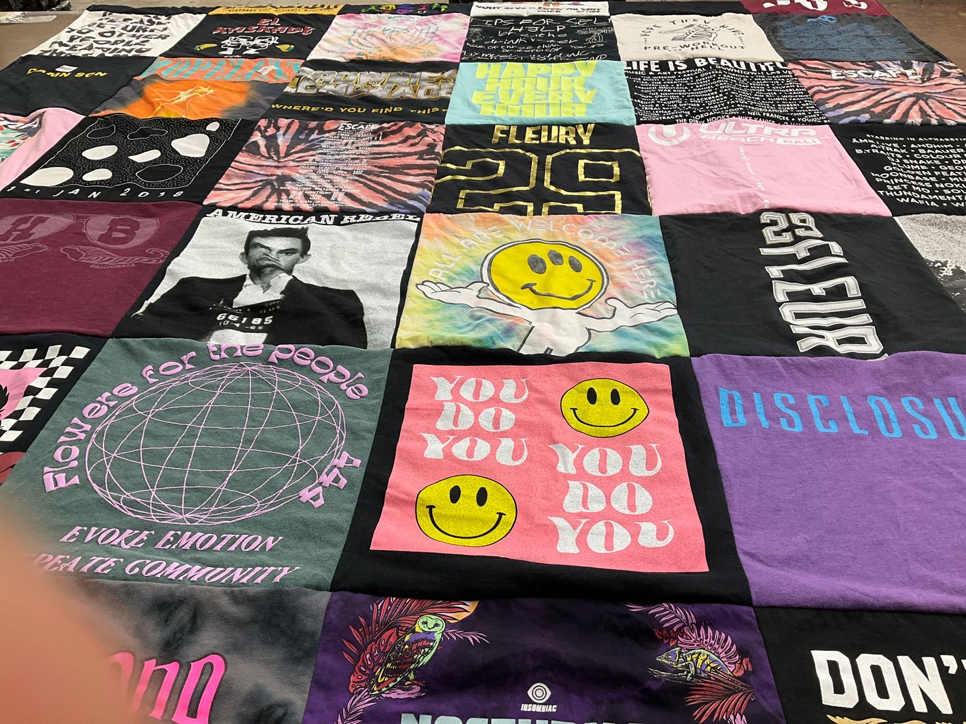 T-shirt quilt with music, art themes by Emily from NV