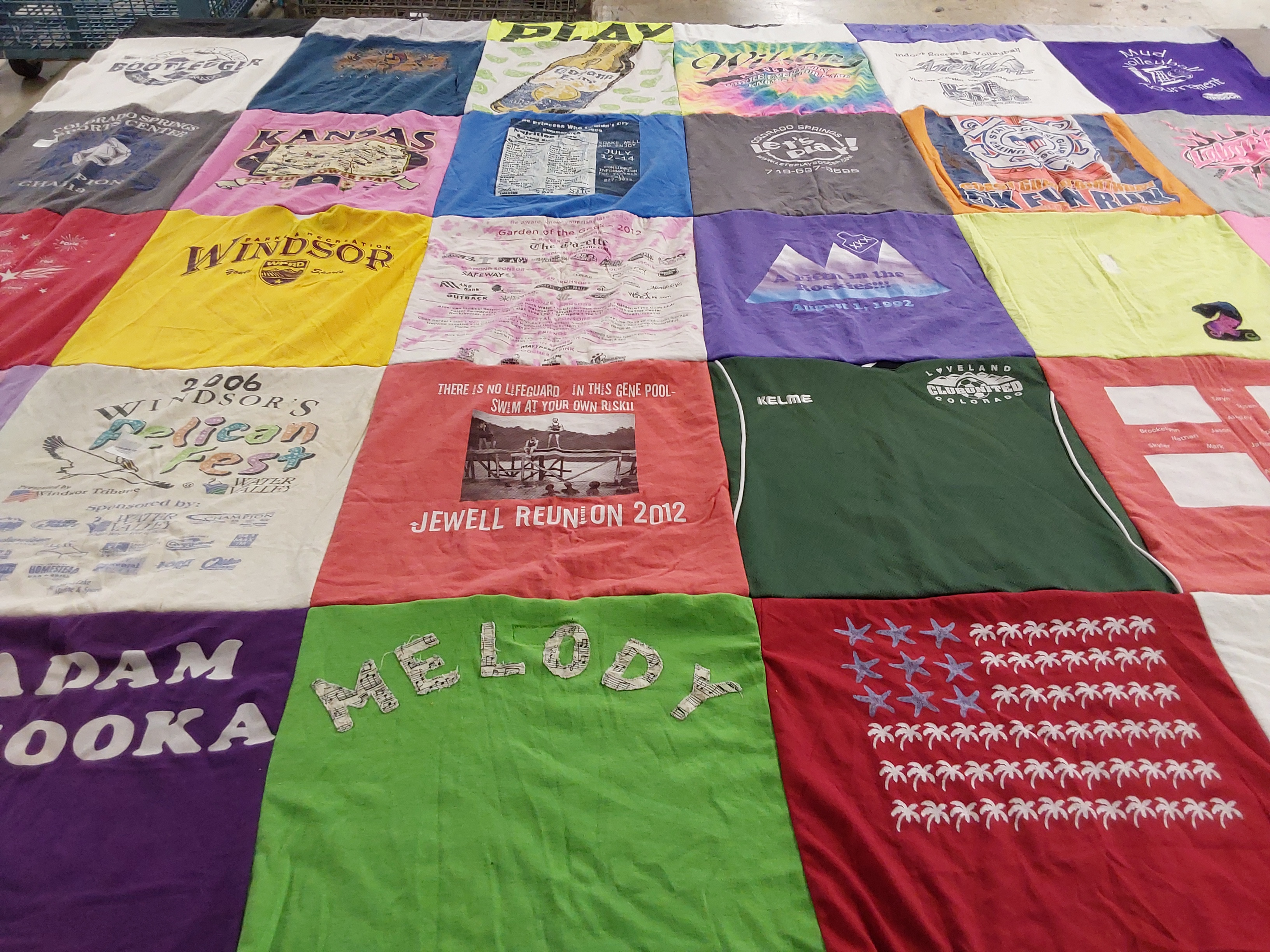 T-shirt quilt with family reunions, festivals themes by Tyler from CO