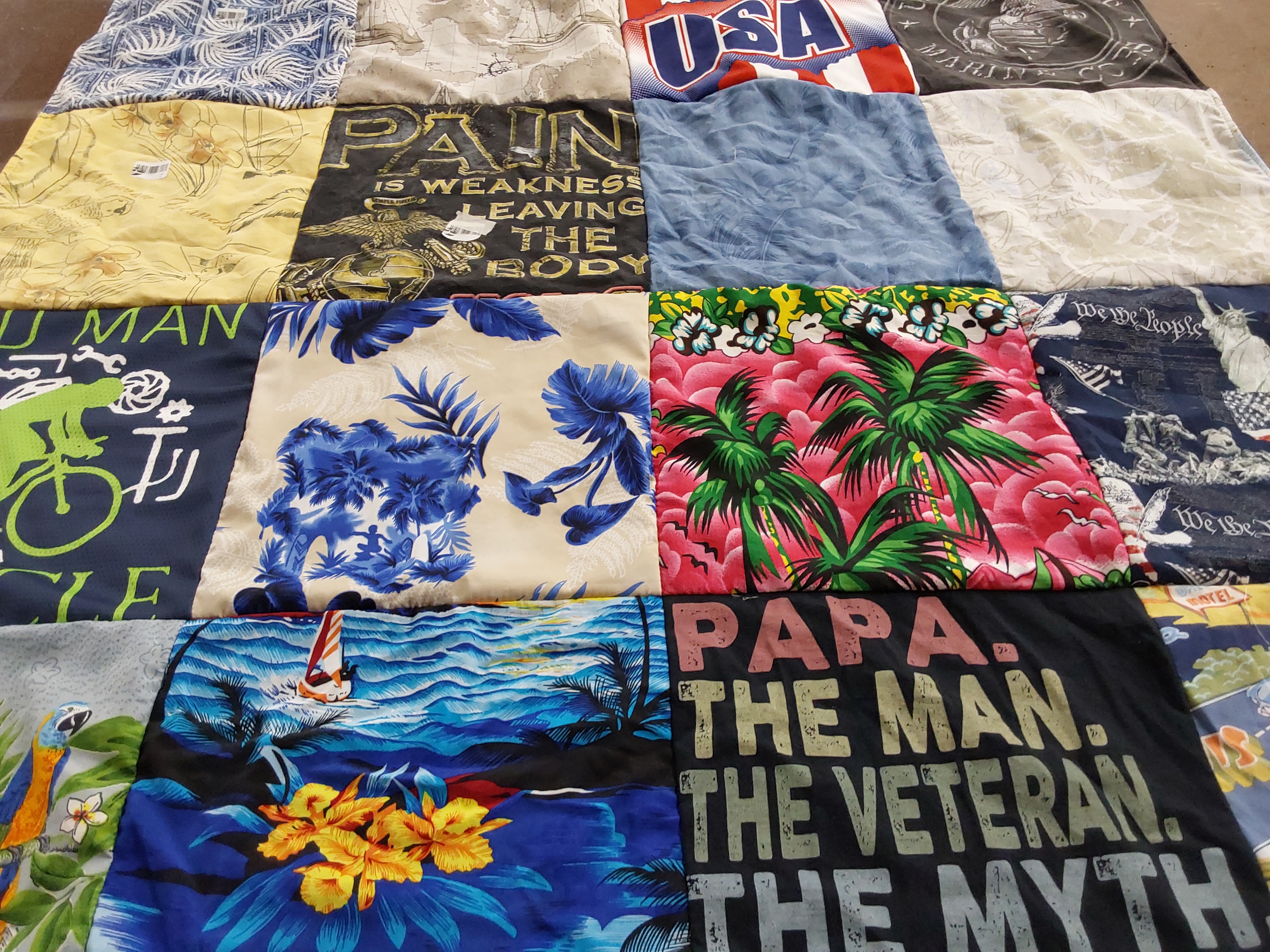 T-shirt quilt with cycling, patriotism themes by Teri from NC