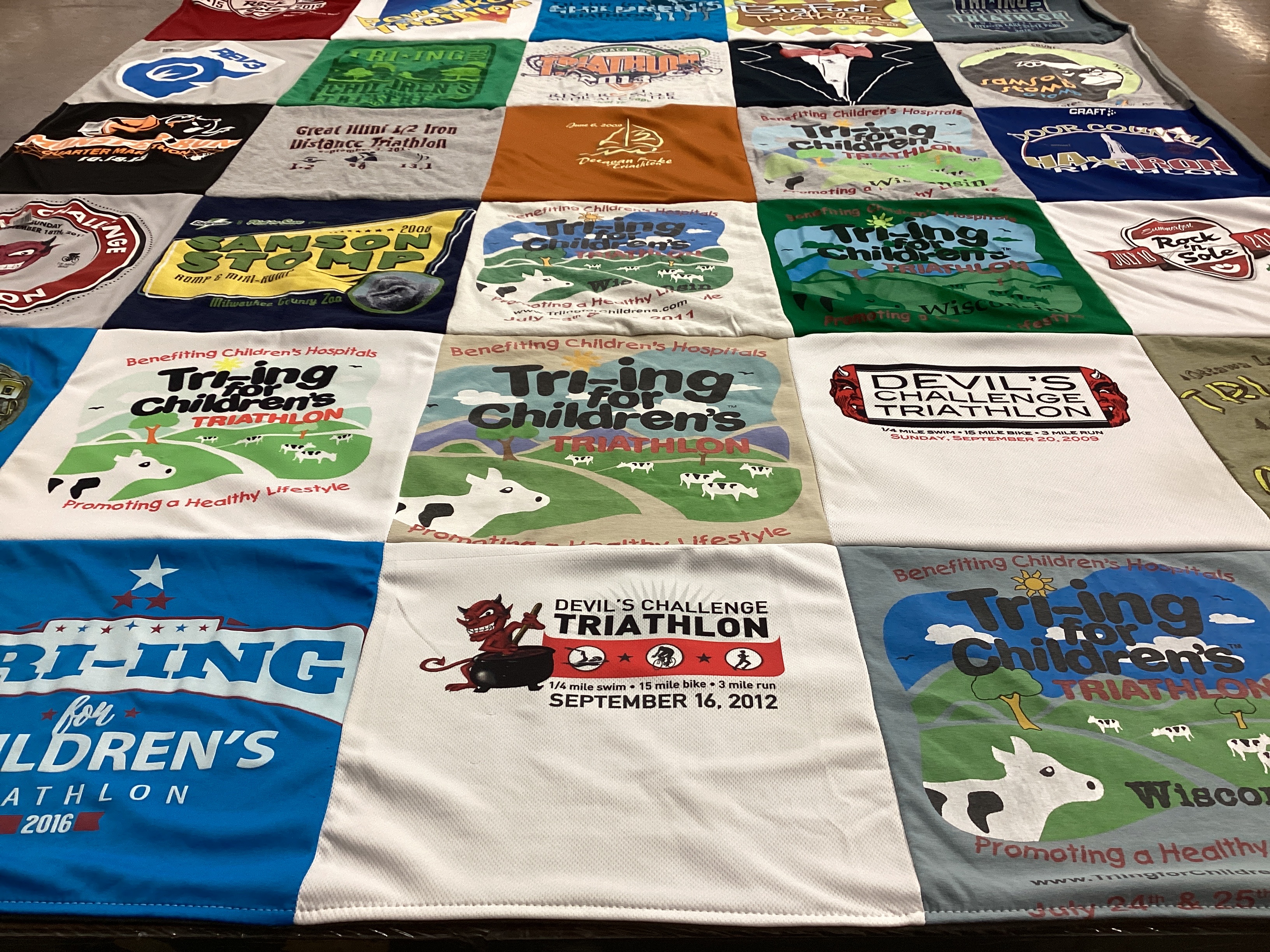 T-shirt quilt with fitness, charity themes by John from WI