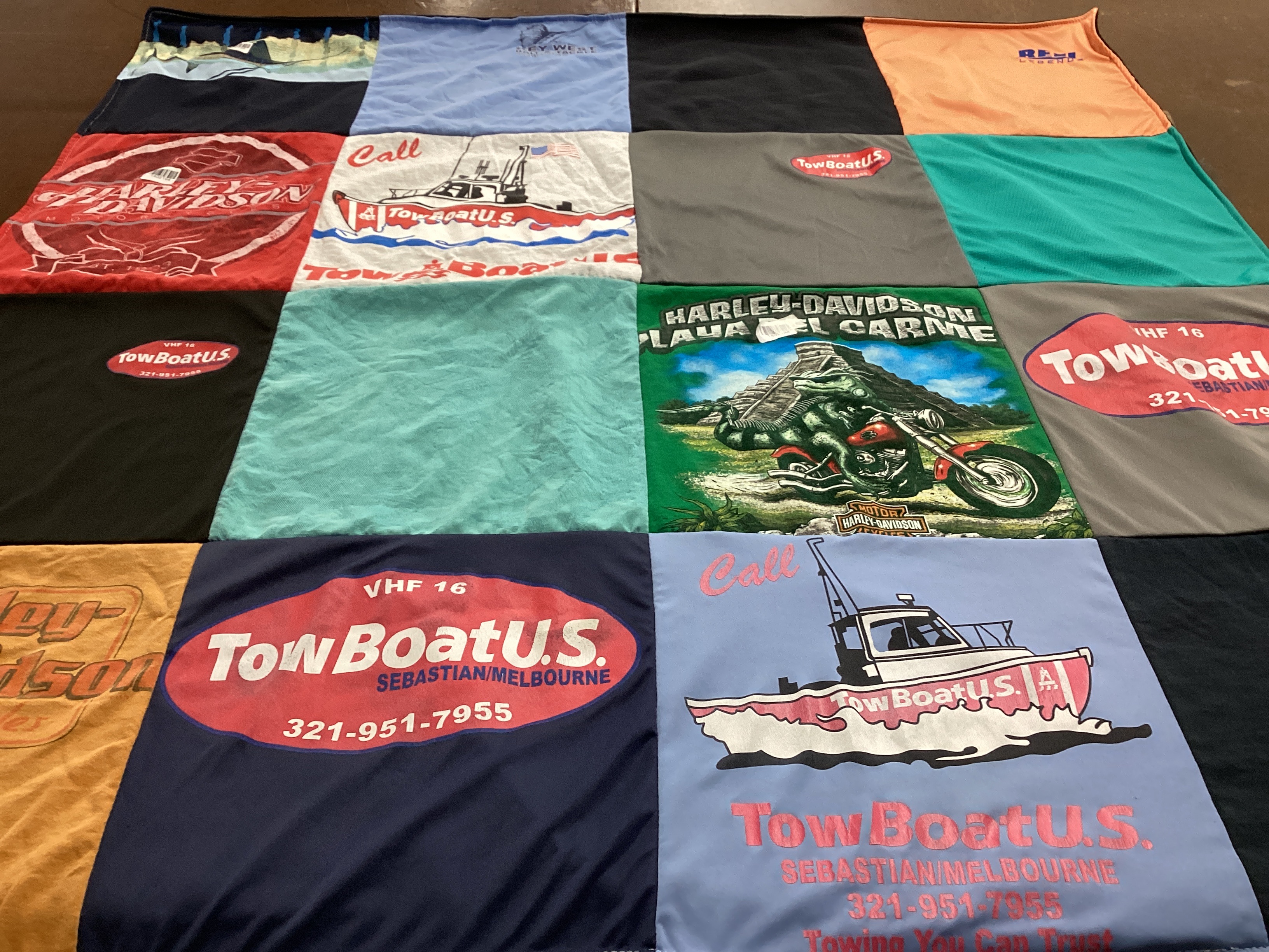 T-shirt quilt with motorcycles, boating themes by Patricia from FL