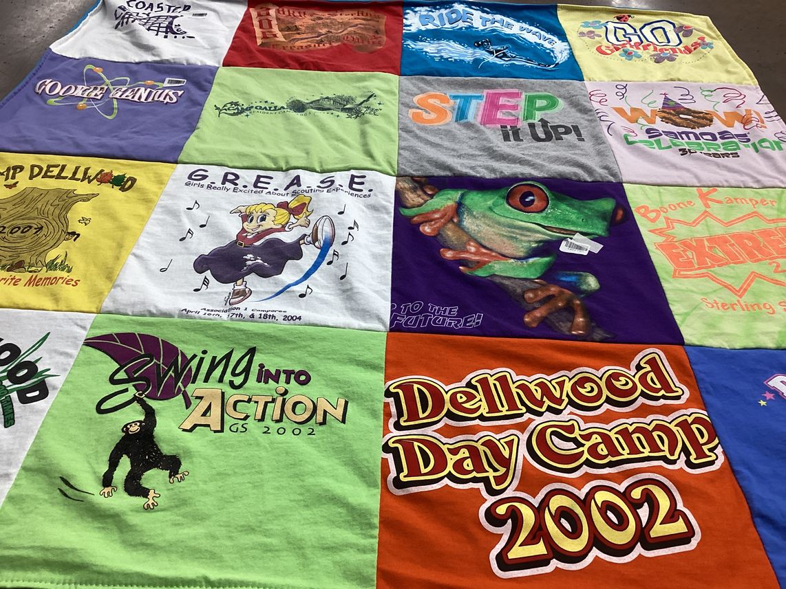 T-shirt quilt with camping, theater themes by Pam from IN