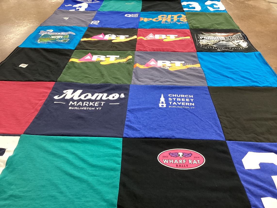 T-shirt quilt with local businesses, events themes by Patricia from TN