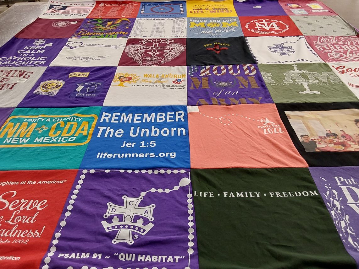 T-shirt quilt with catholicism, family themes by Rosita from NM