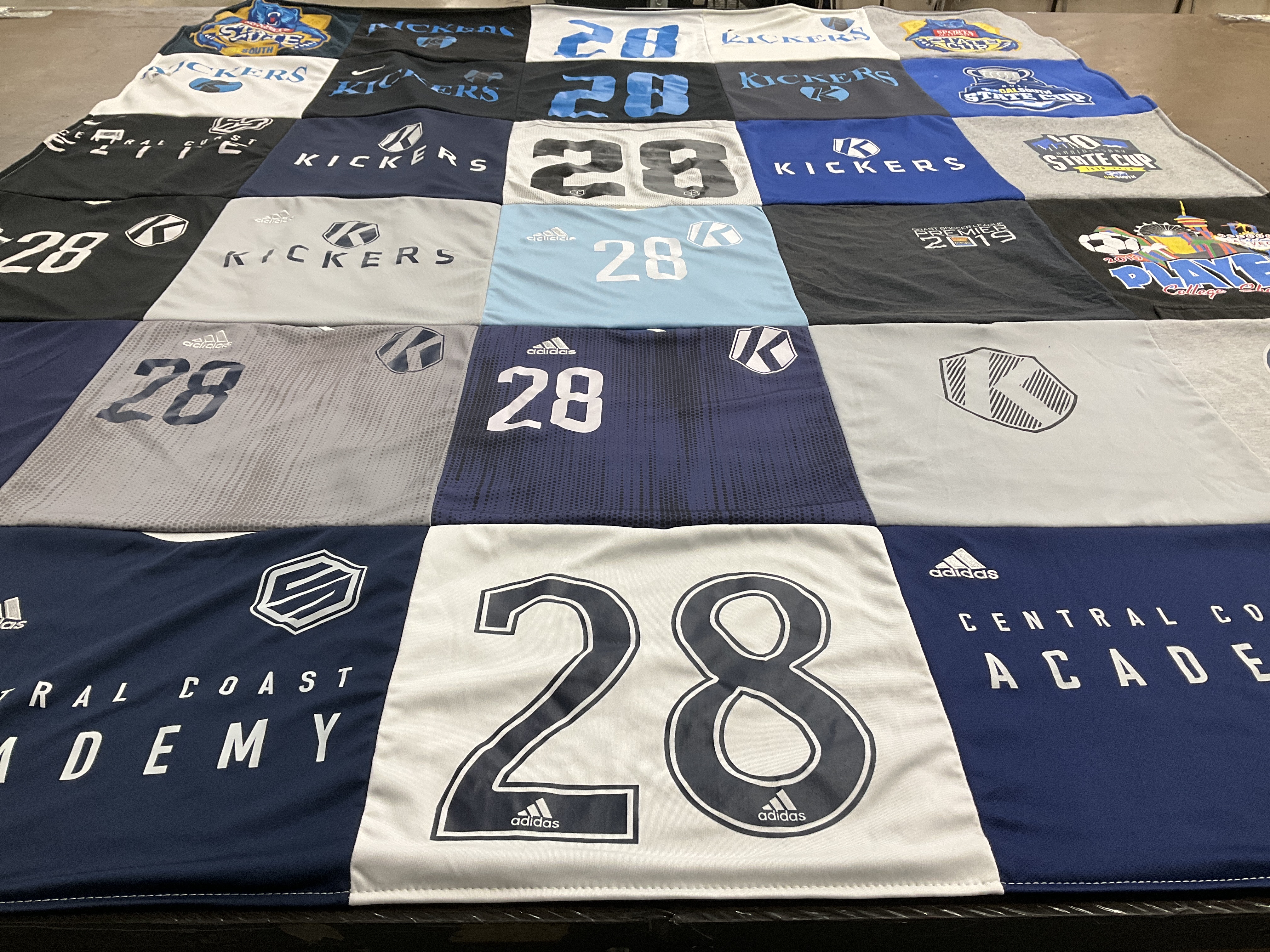 T-shirt quilt with soccer, sports themes by Claudia from CA