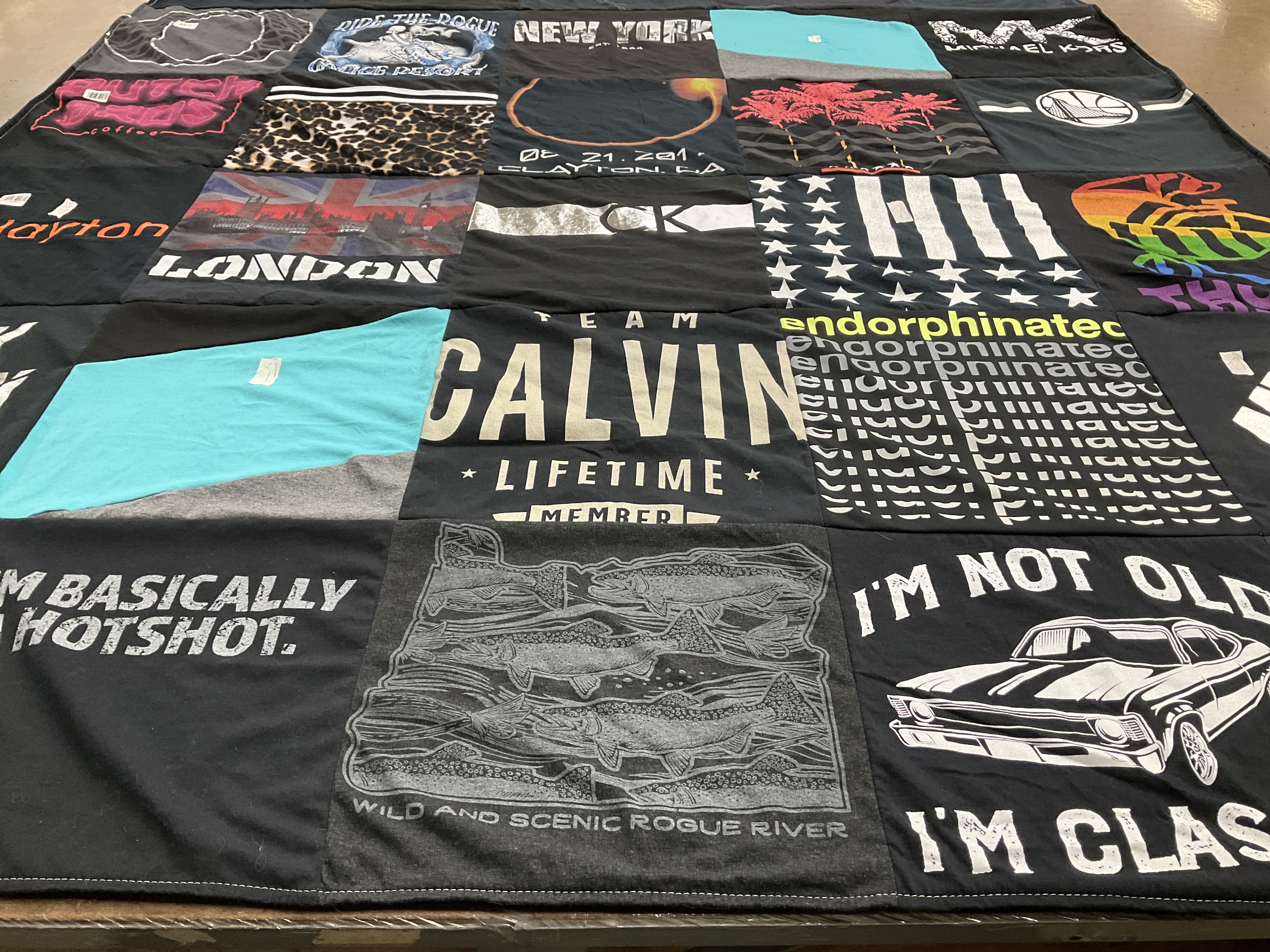 T-shirt quilt with travel, coffee themes by Ashley from OR
