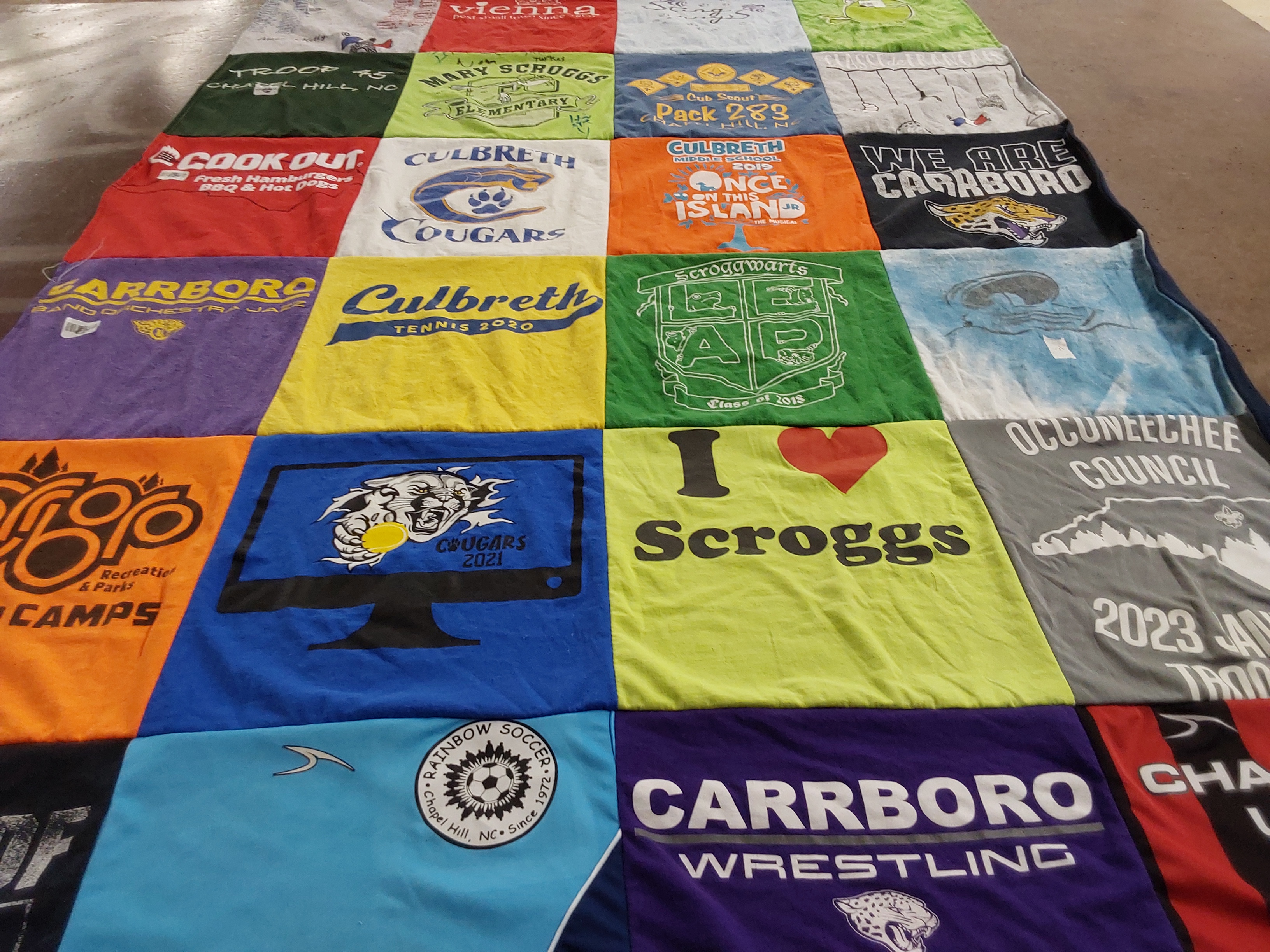 T-shirt quilt featuring culbreth cougars, carrboro wrestling by Michele from NC