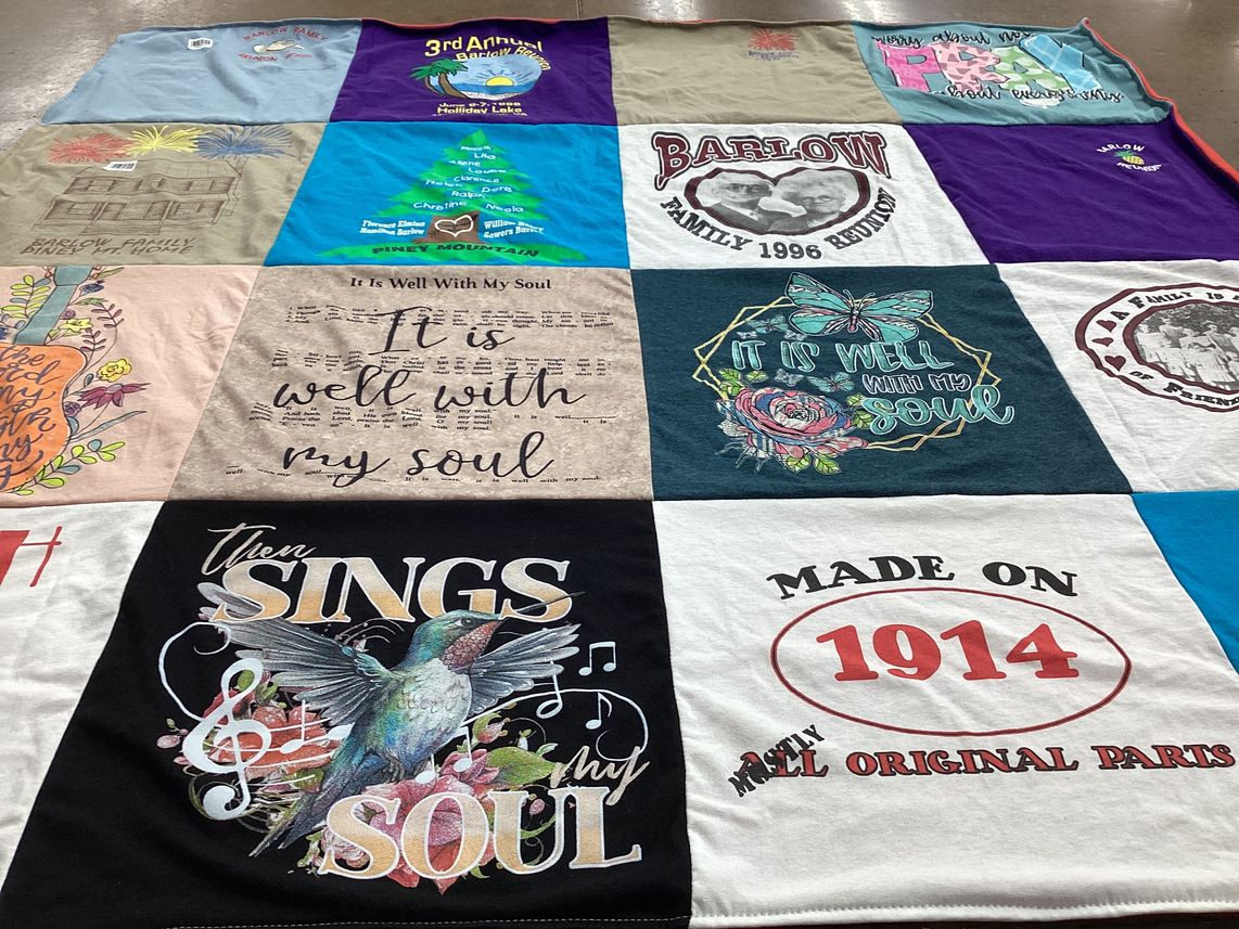 T-shirt quilt with family gatherings, music themes by Judy from VA