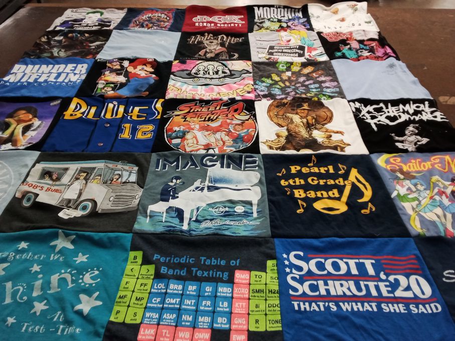 T-shirt quilt with television, music themes by Nora from MS