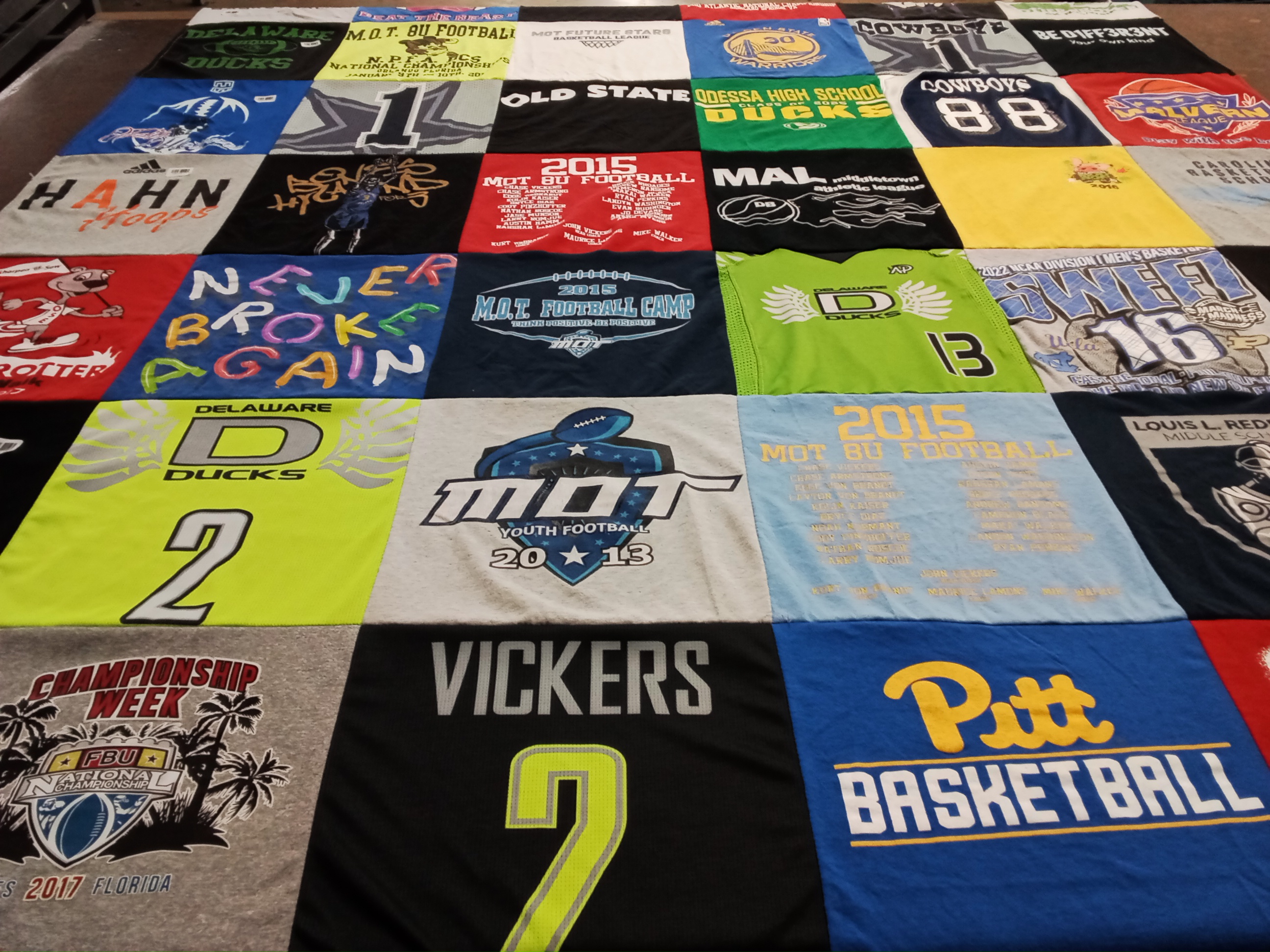 T-shirt quilt featuring delaware ducks, pitt basketball by stacy from DE