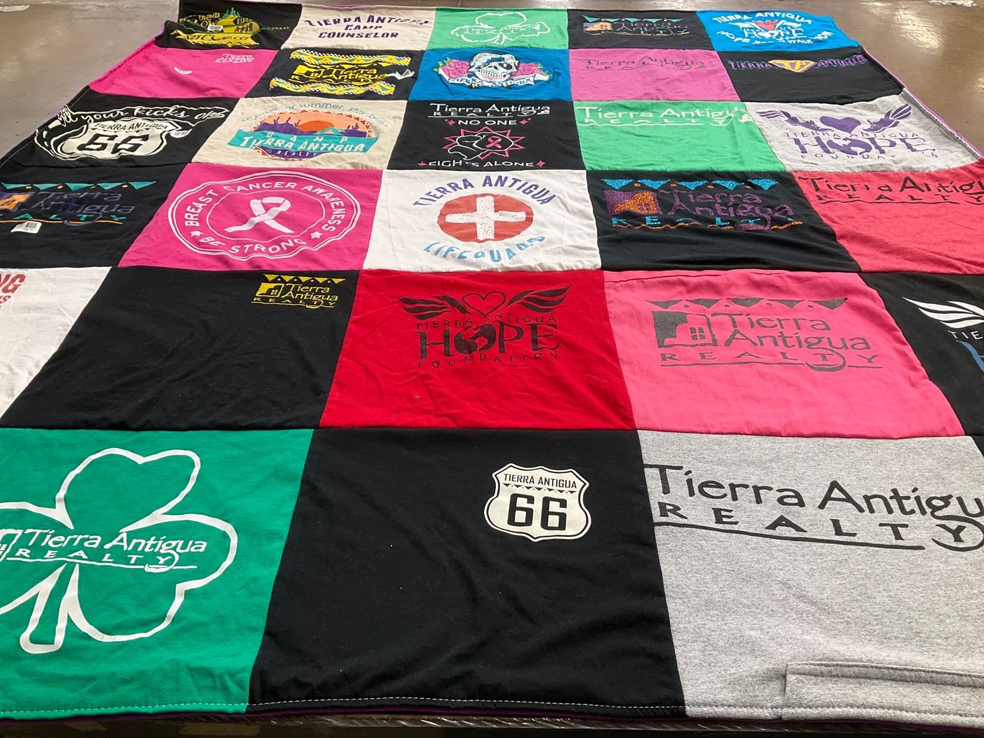 T-shirt quilt with real estate, charity themes by bella from AZ