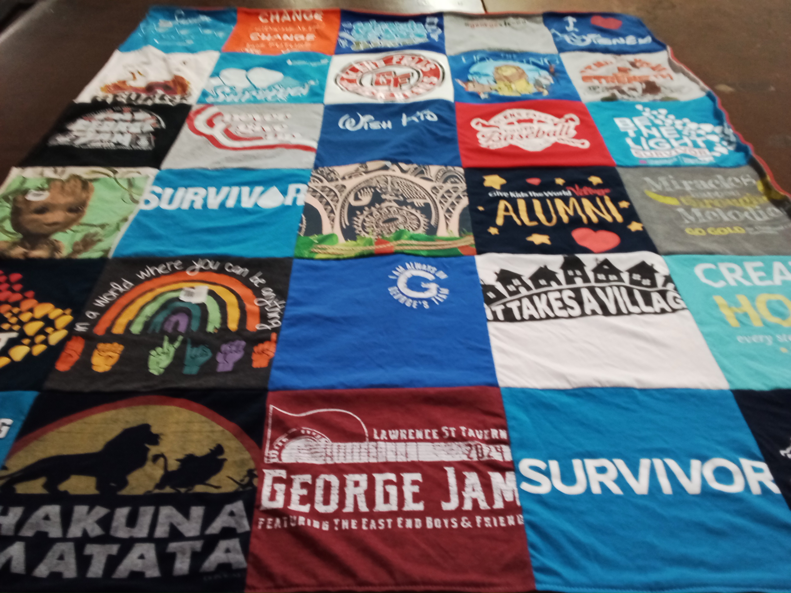 T-shirt quilt with community, support themes by Sarah from NY