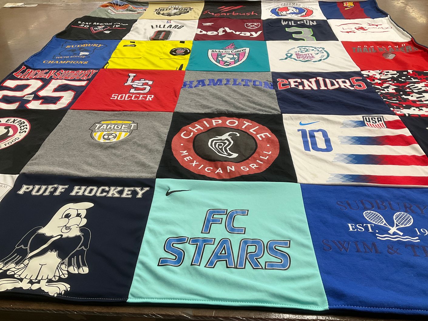 T-shirt quilt featuring fc stars, sudbury soccer team by Rosalyn from MA