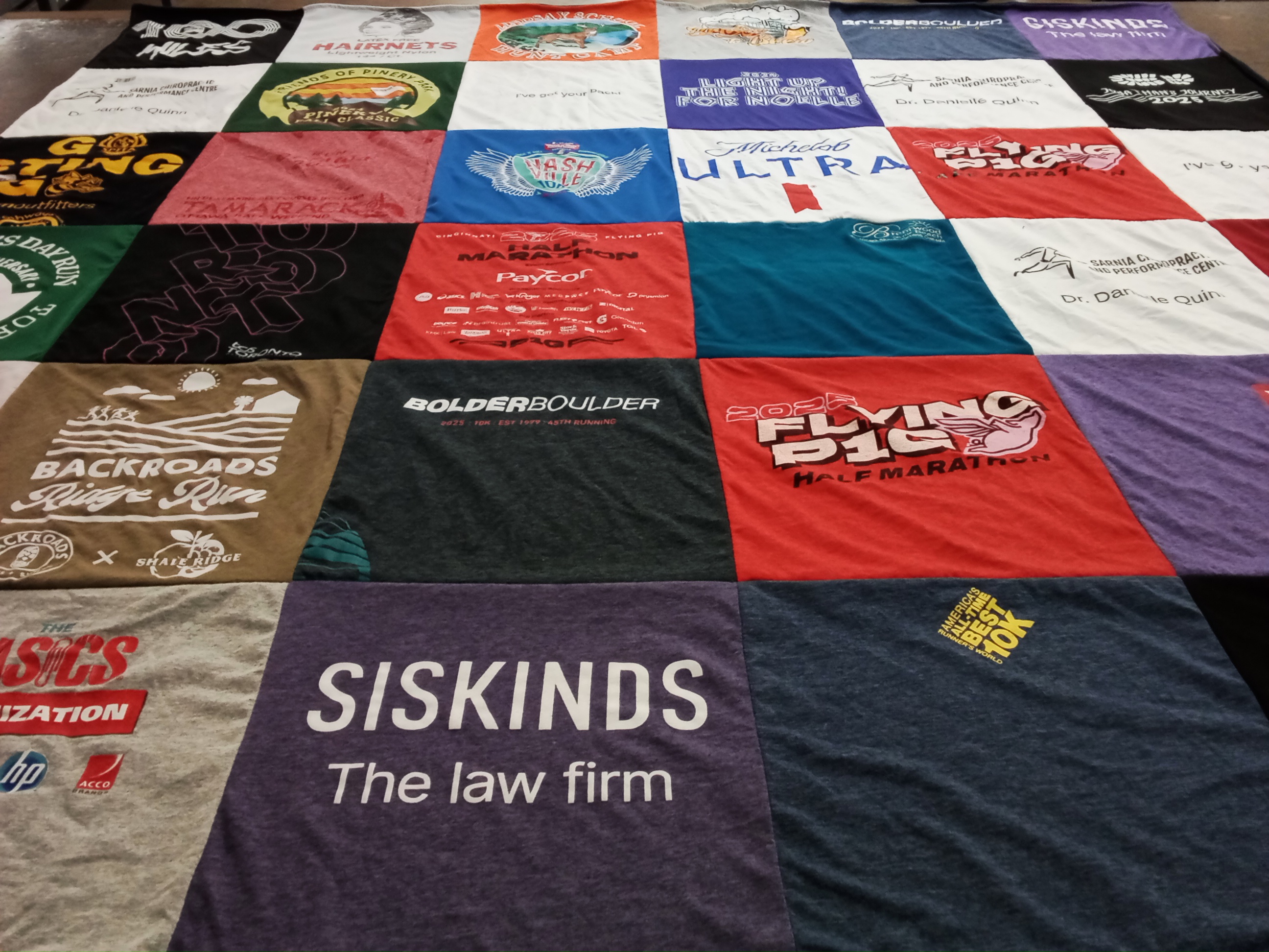 T-shirt quilt with running, law themes by Danielle from ON