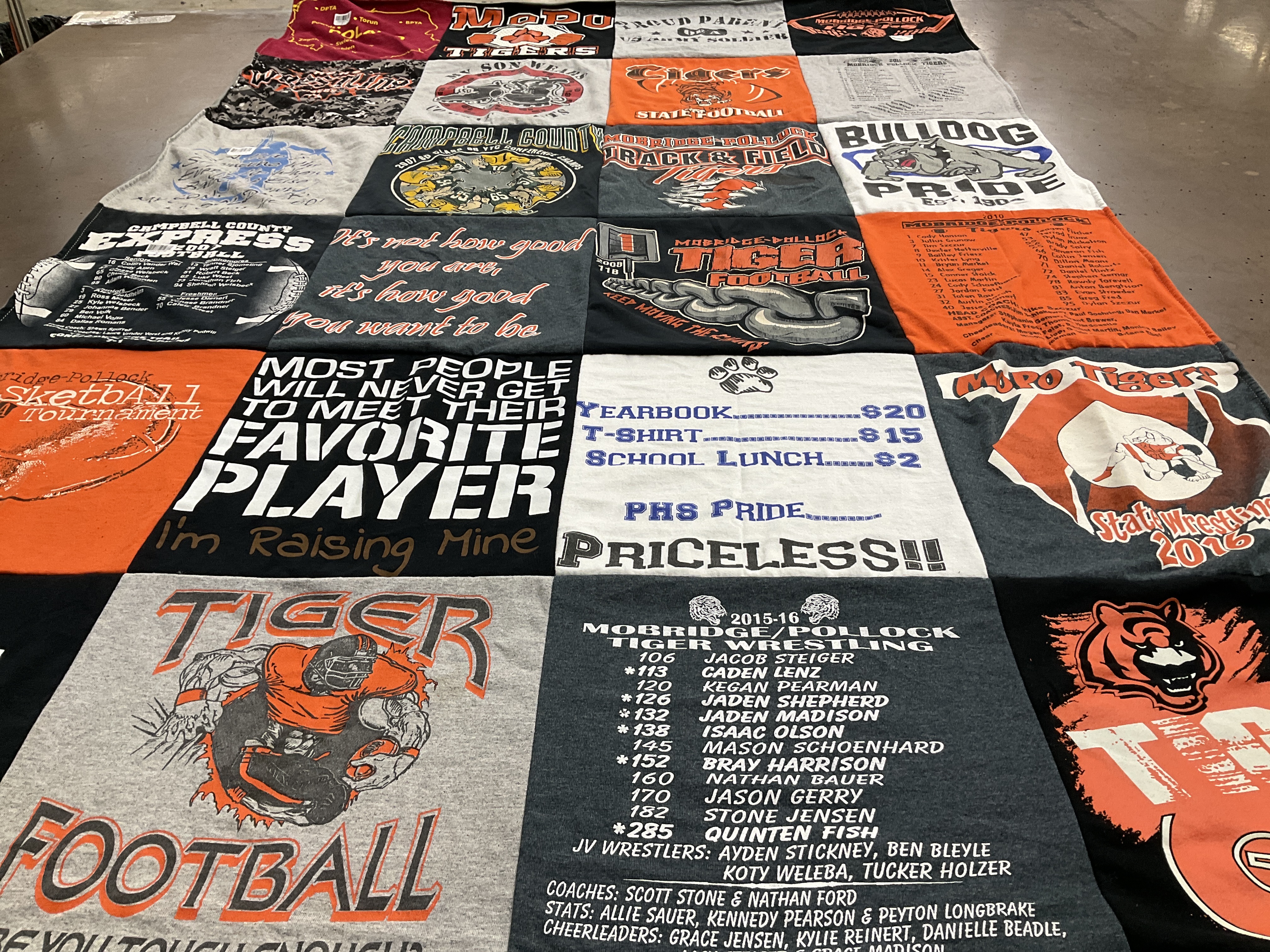 T-shirt quilt featuring moro tigers, bridge-pollock tiger wrestling by Laurie from SD