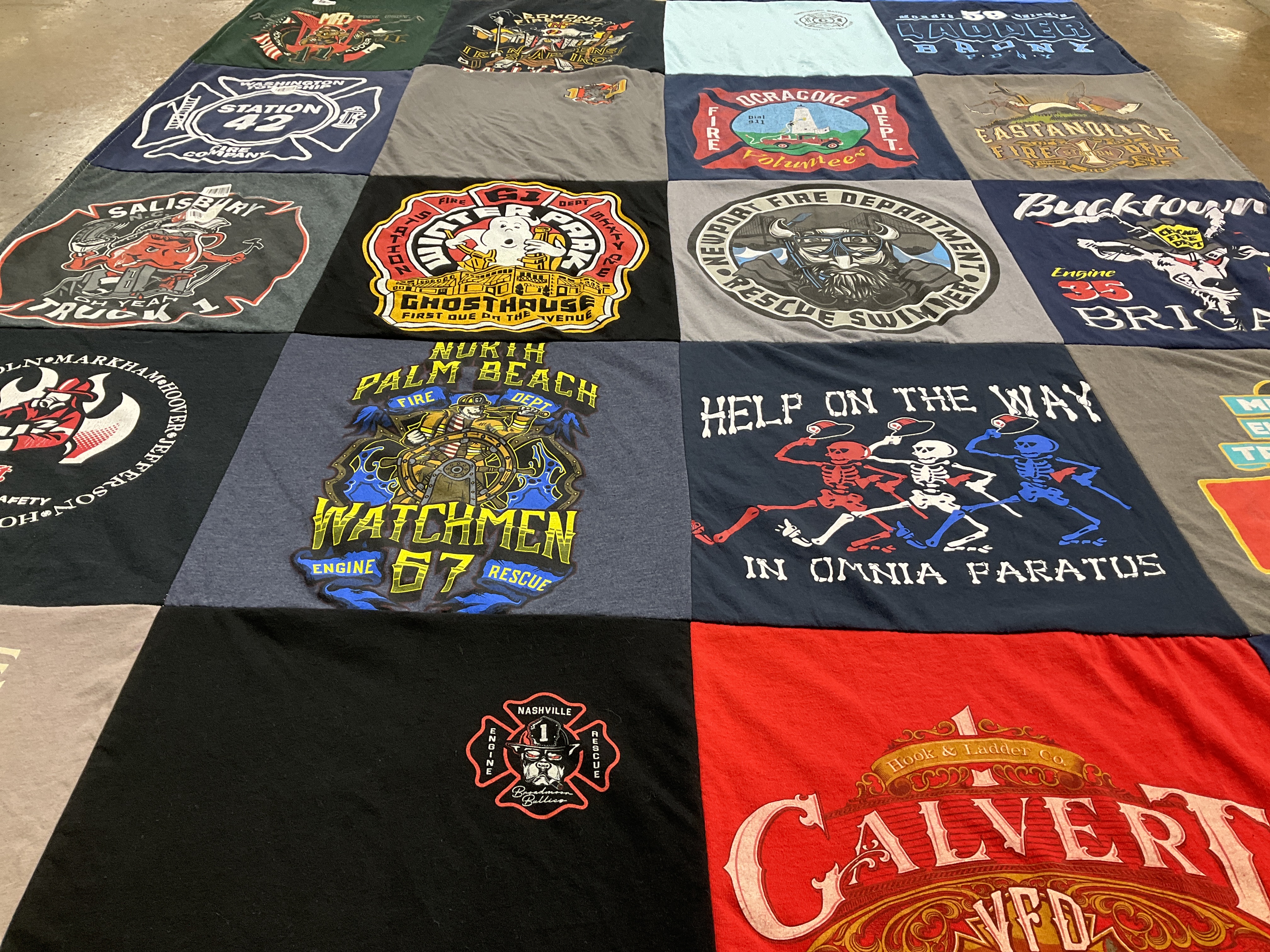 T-shirt quilt with firefighting, community service themes by Deb from PA