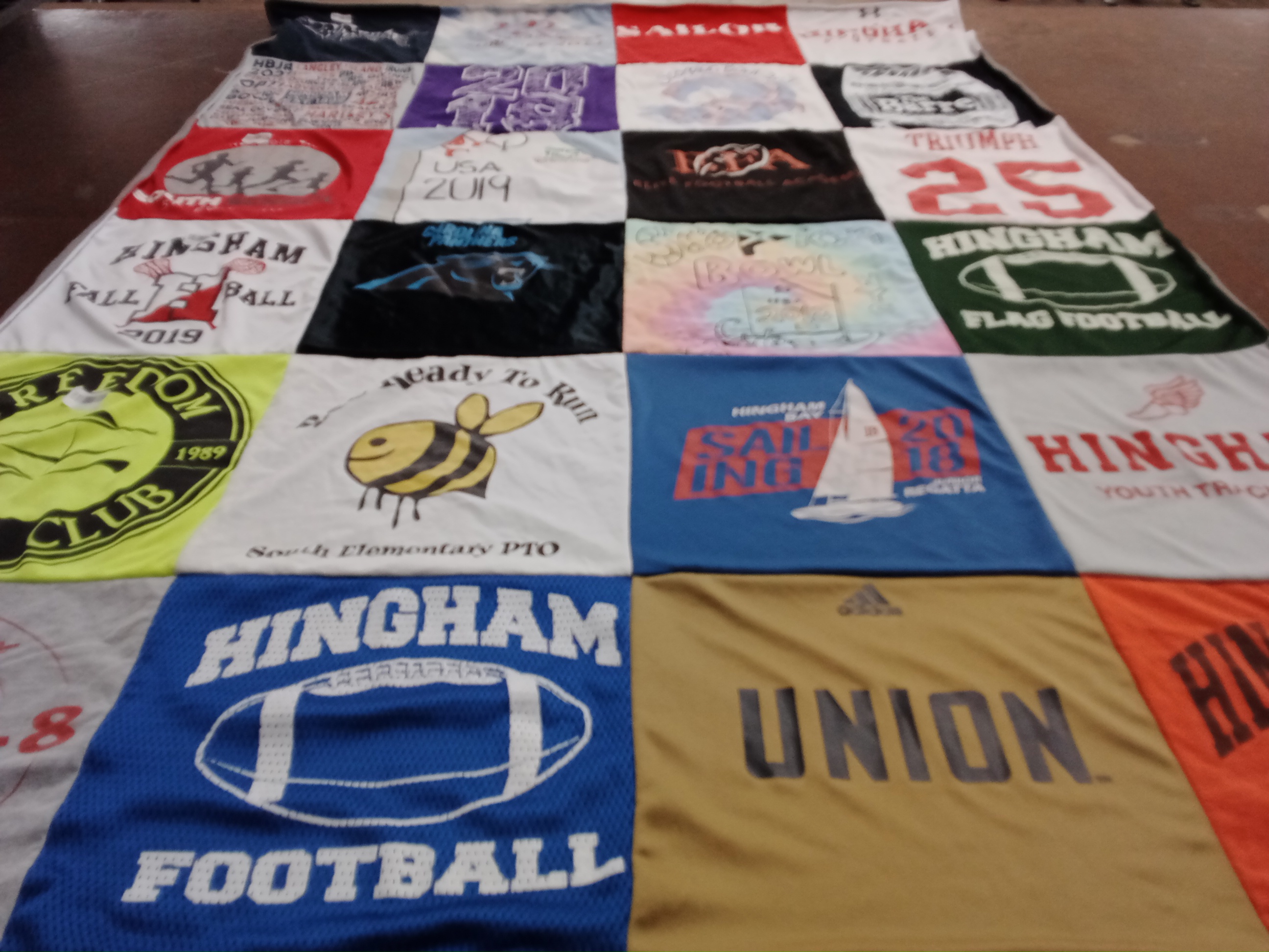 T-shirt quilt featuring hingham youth track, hingham football by Elizabeth from MA