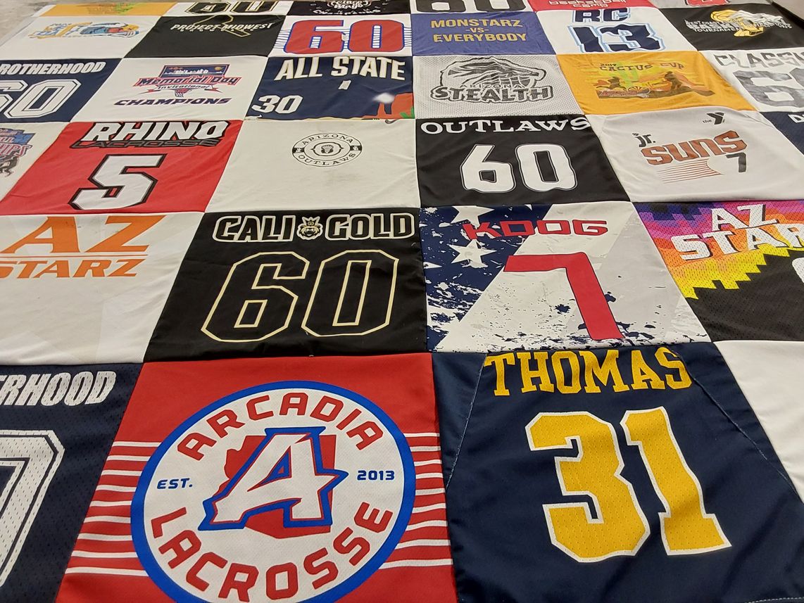 T-shirt quilt with lacrosse, sports themes by Kristi from AZ