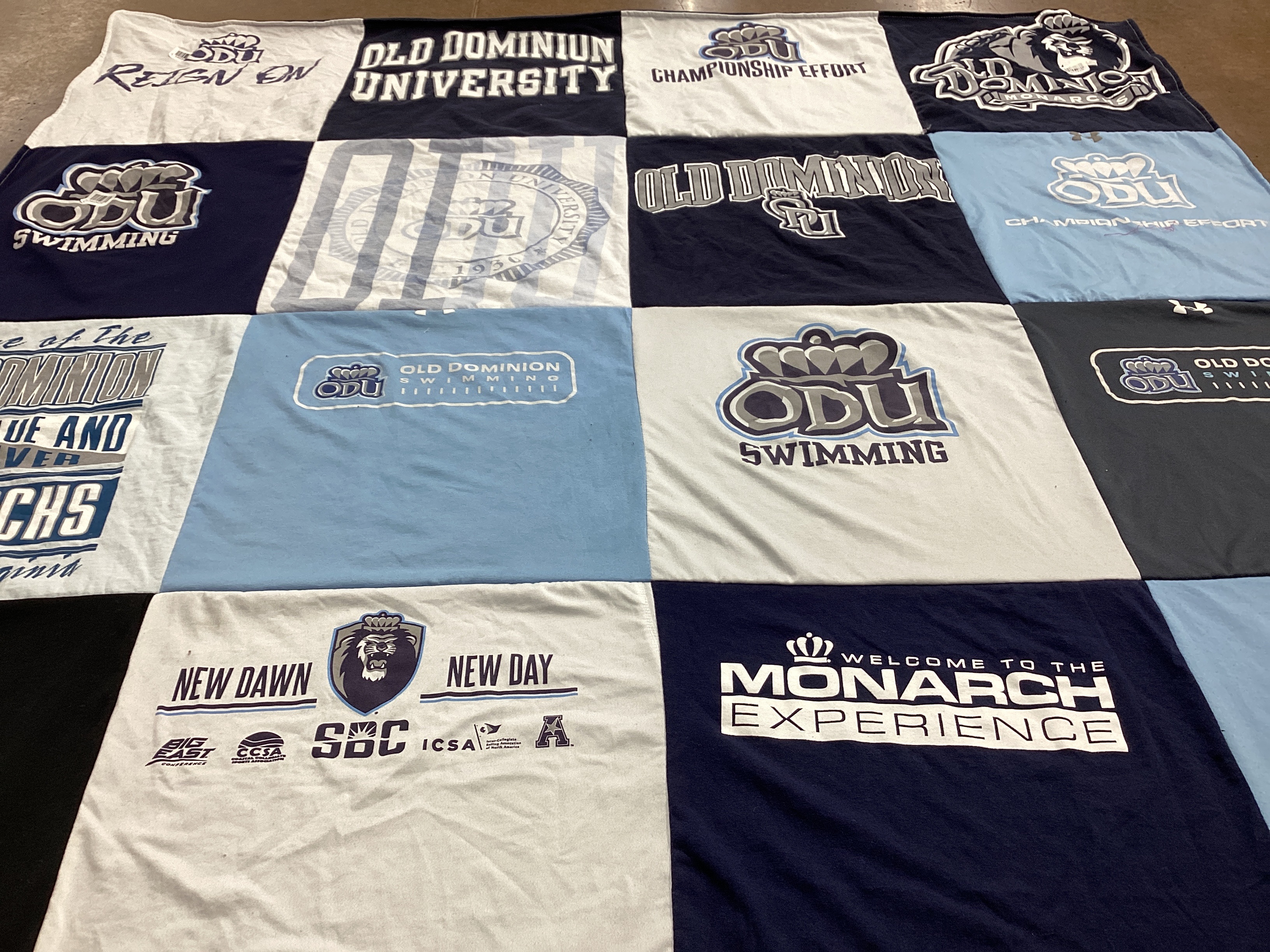 T-shirt quilt featuring old dominion swimming by Marian from TX