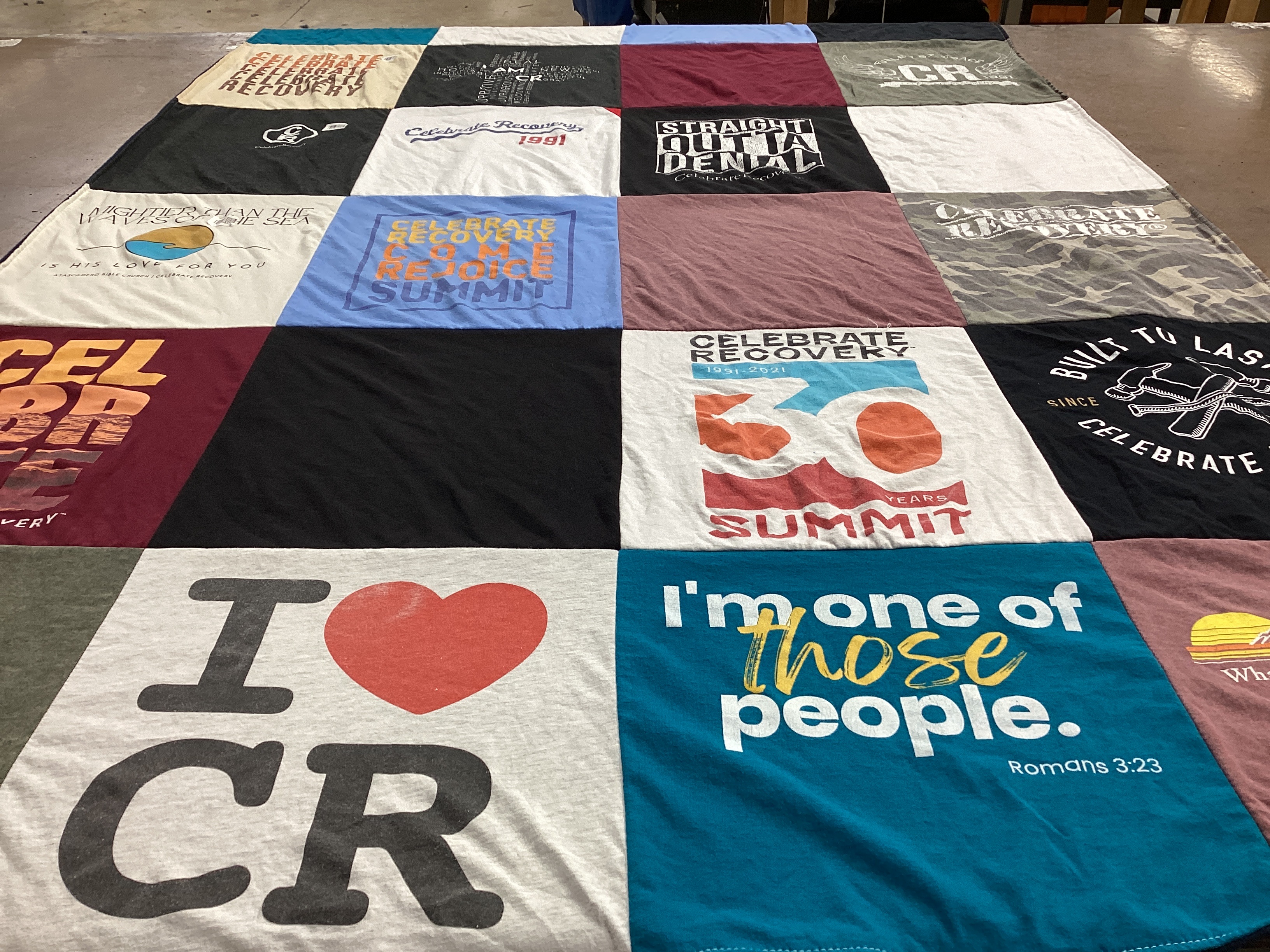 T-shirt quilt with recovery, community support themes by Tania from CA
