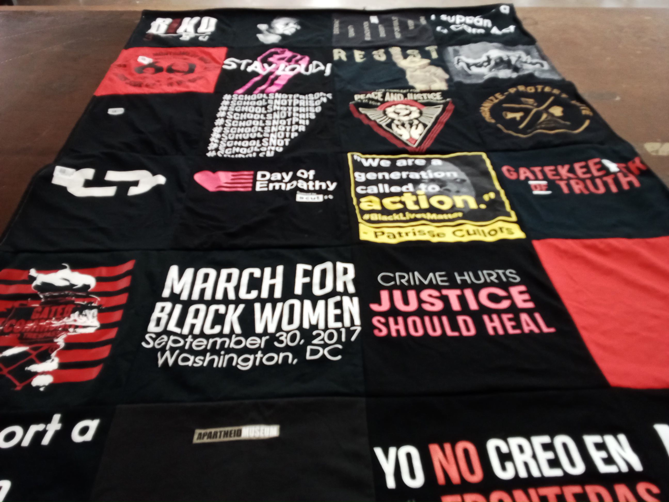 T-shirt quilt with social justice, activism themes by Gina from NY