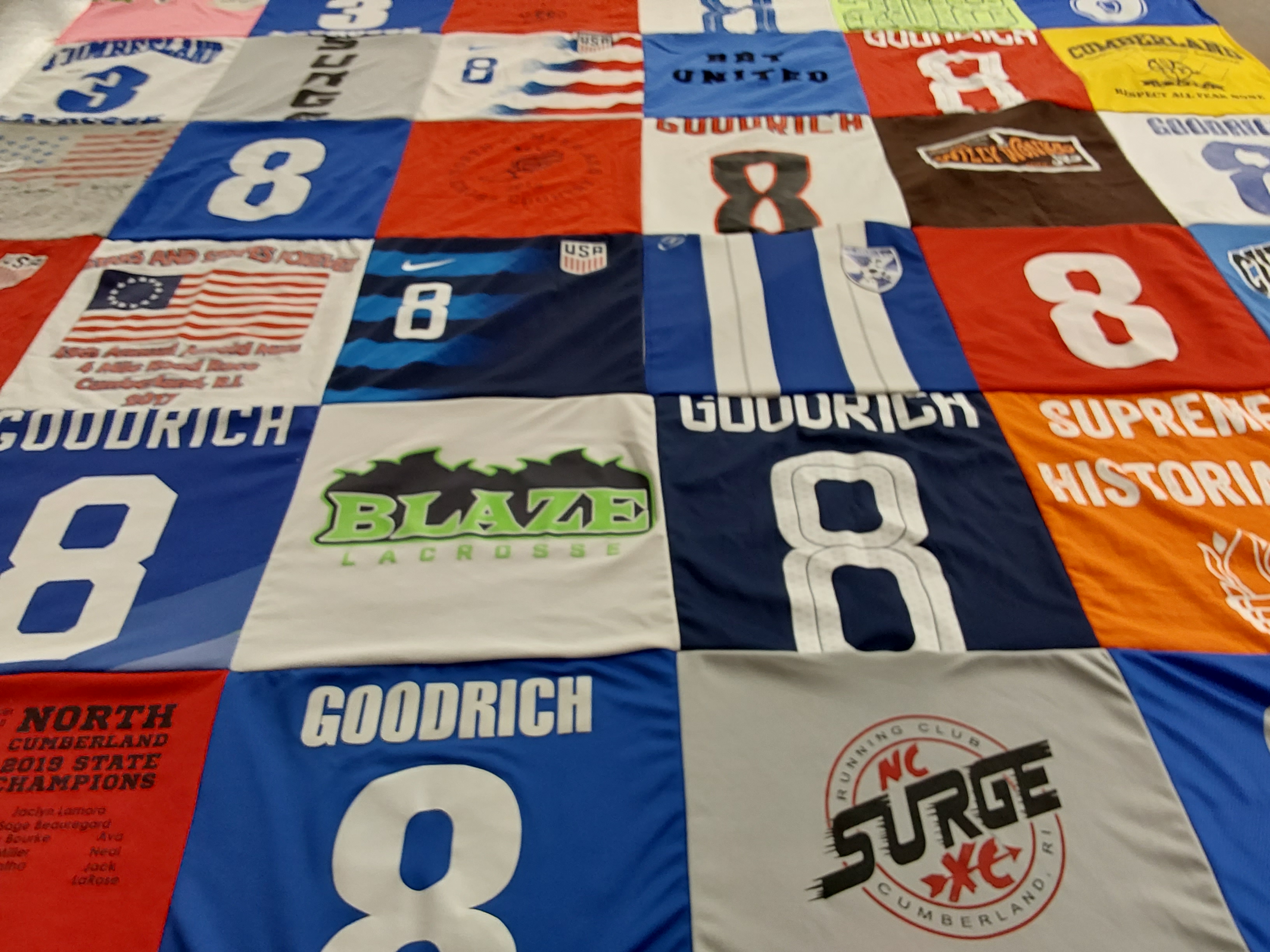 T-shirt quilt with soccer, lacrosse themes by Stefanie from RI