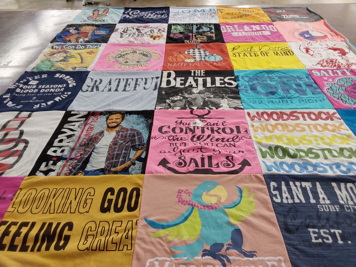 T-shirt quilt with music, concerts themes by Pam from TX