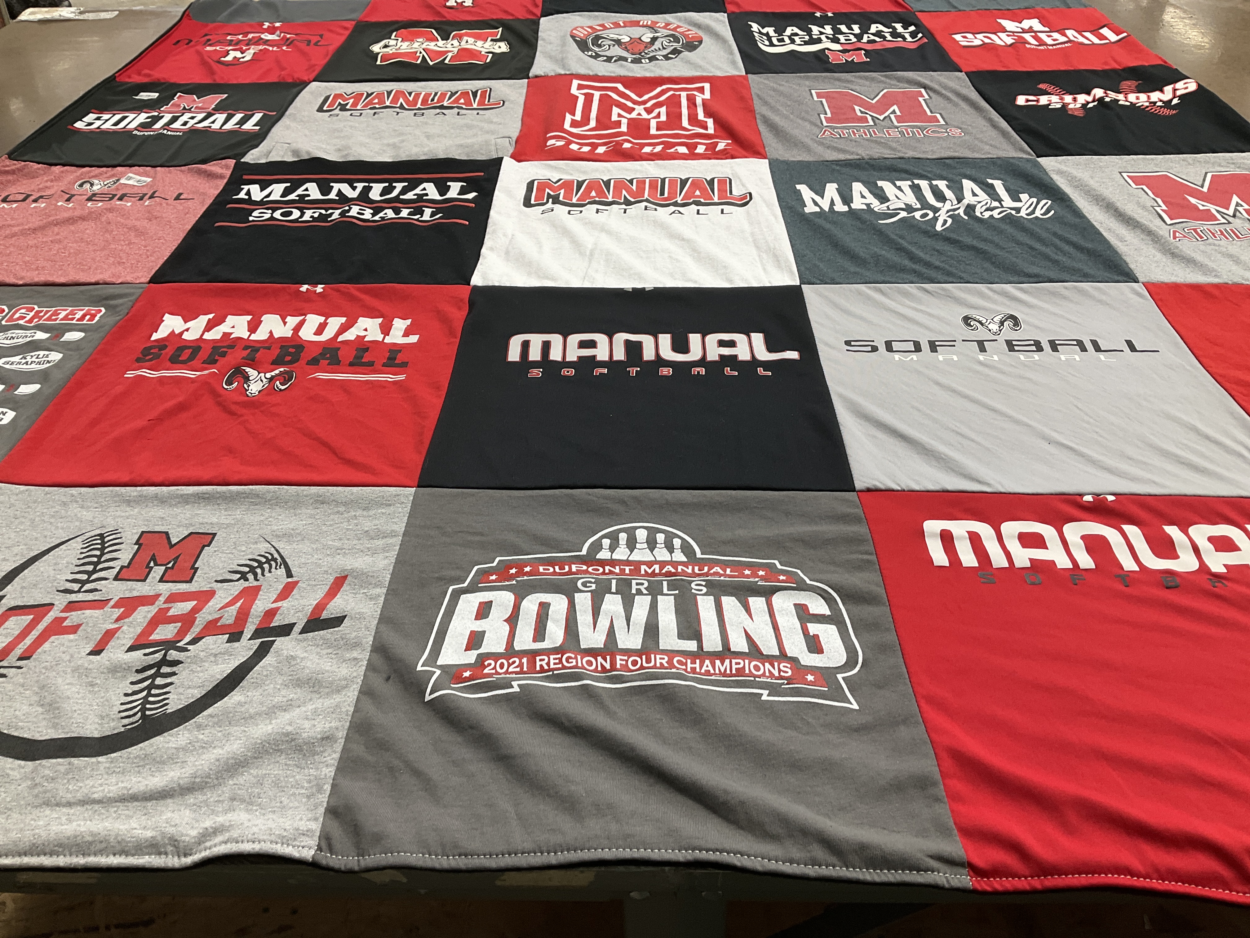 T-shirt quilt featuring dupont manual high school softball, dupont manual girls bowling by Andrea from KY