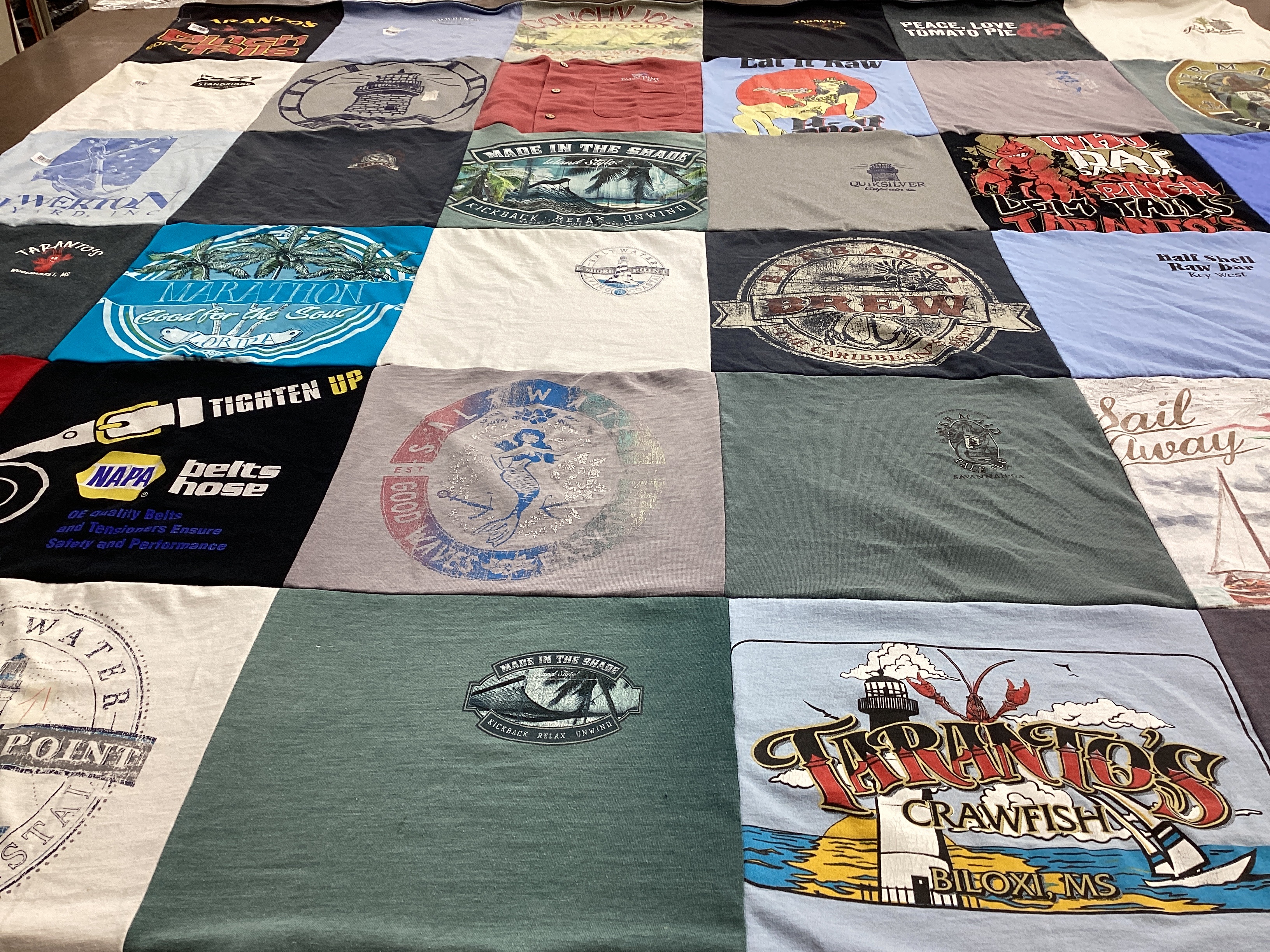T-shirt quilt with fishing, boating themes by Marguerite from MS