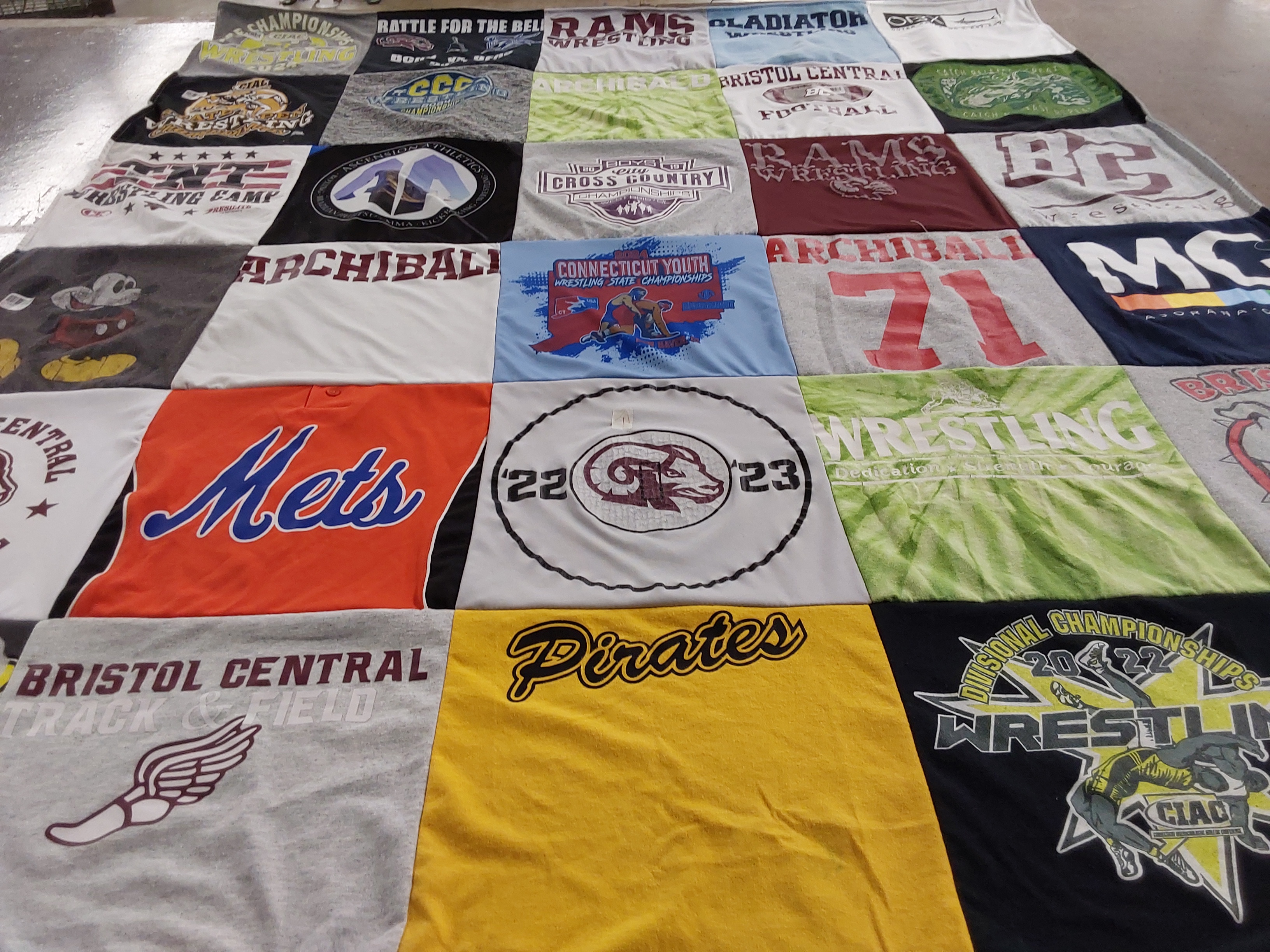 T-shirt quilt featuring bristol central track and field, archibald middle school wrestling by Jean from CT