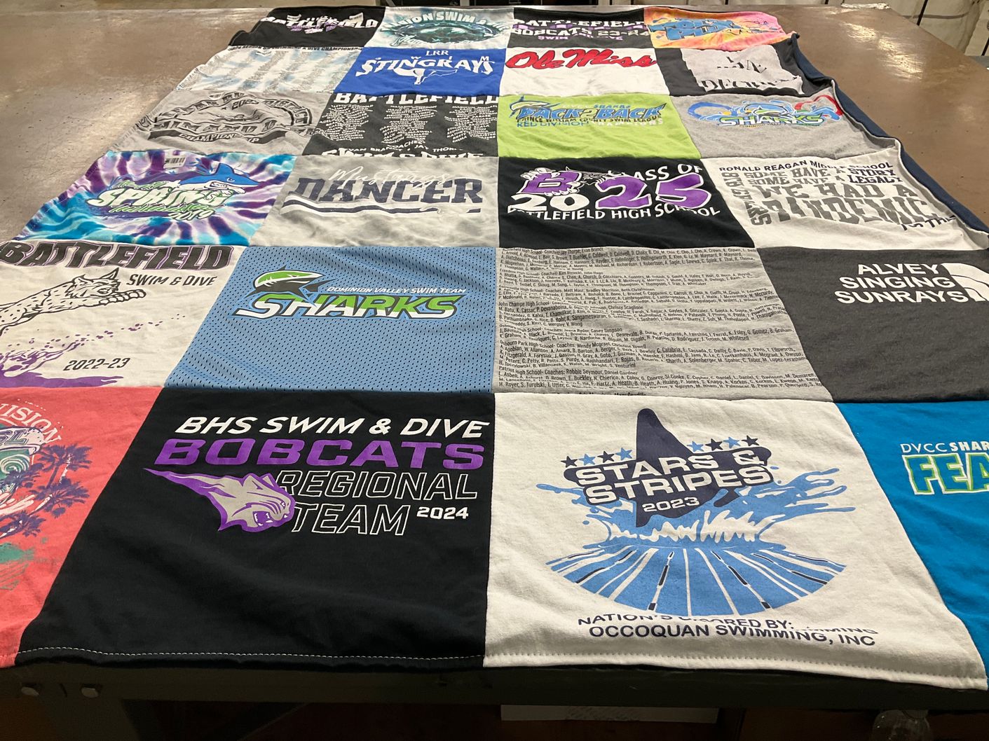 T-shirt quilt featuring battlefield swim & dive team, ococquan swim team by Jonna from VA