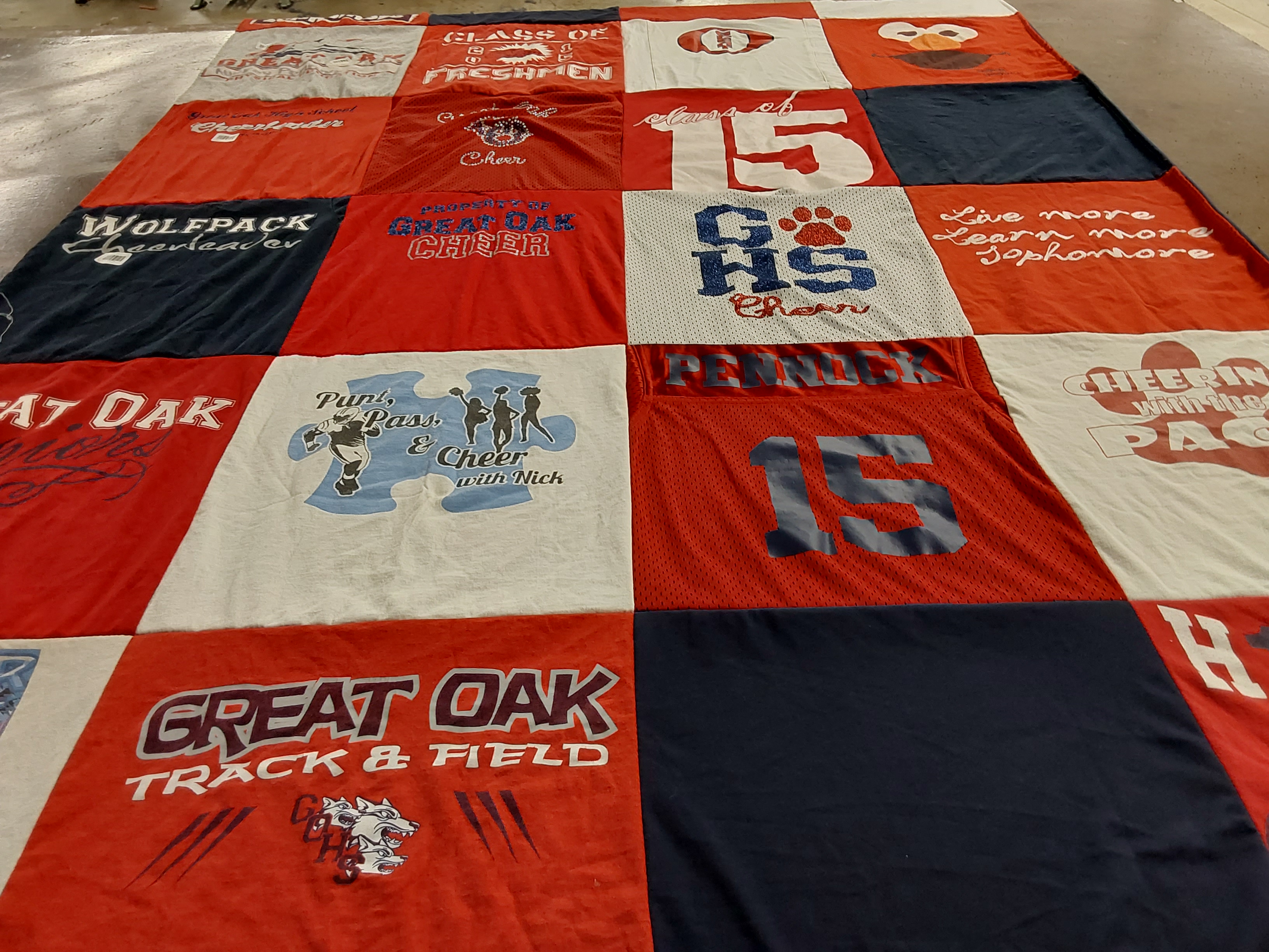 T-shirt quilt featuring great oak track and field, great oak cheer by Lynn from CA