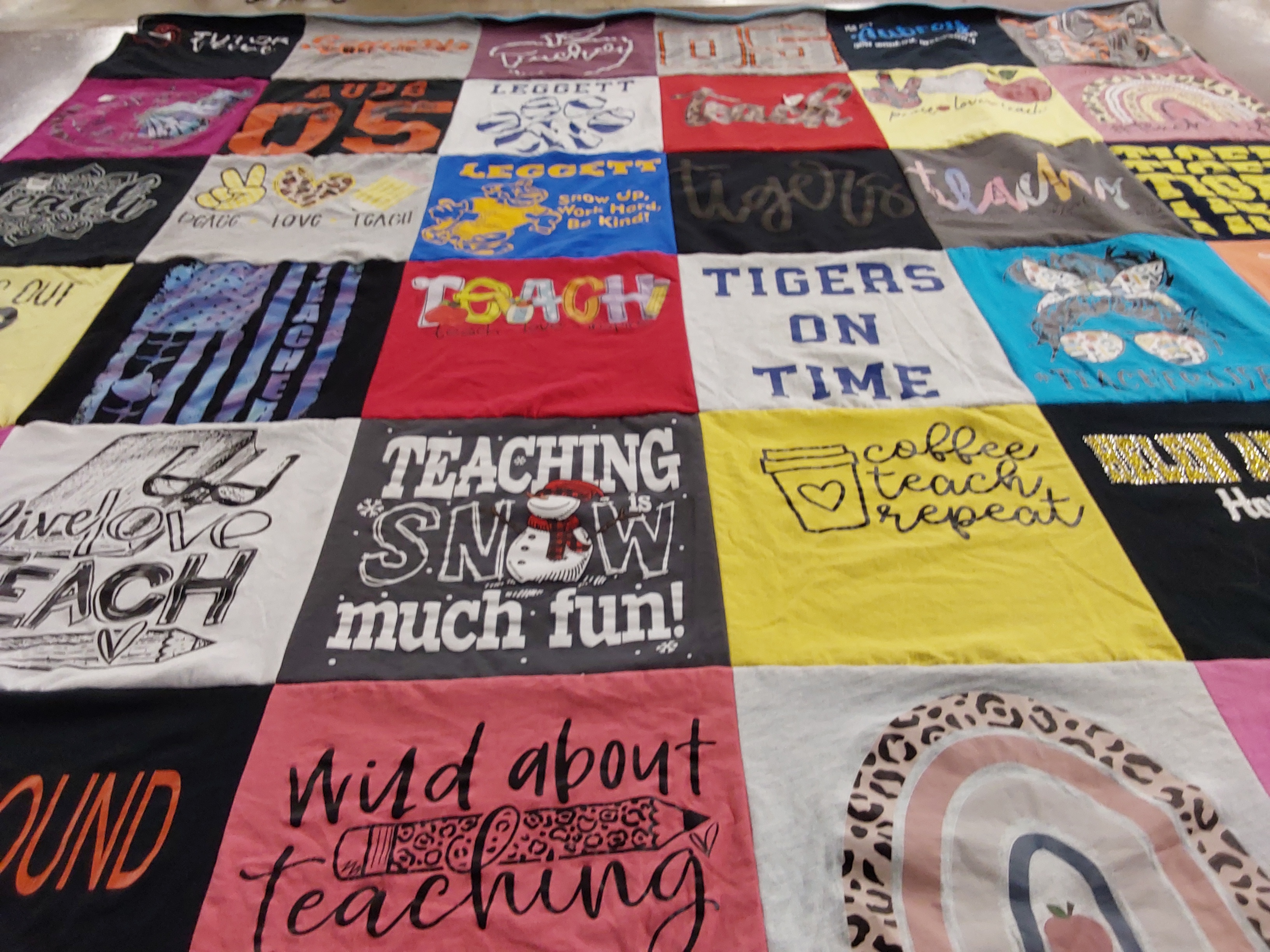 T-shirt quilt with teaching, education themes by Aubrey from OH