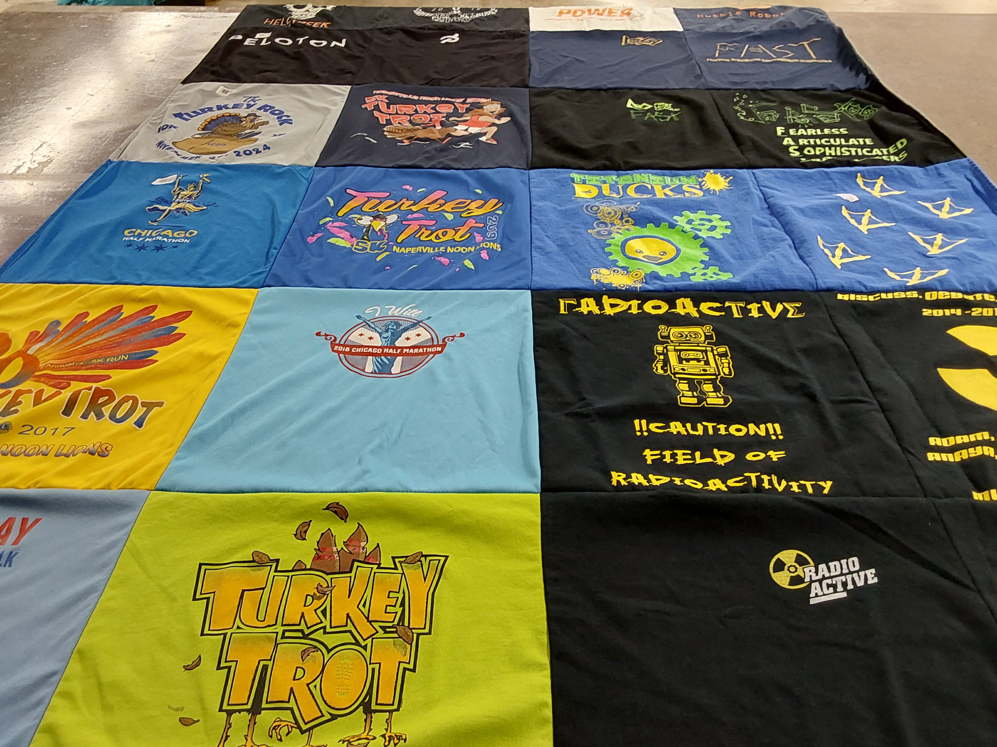 T-shirt quilt with running, sports themes by Mustafa from IL