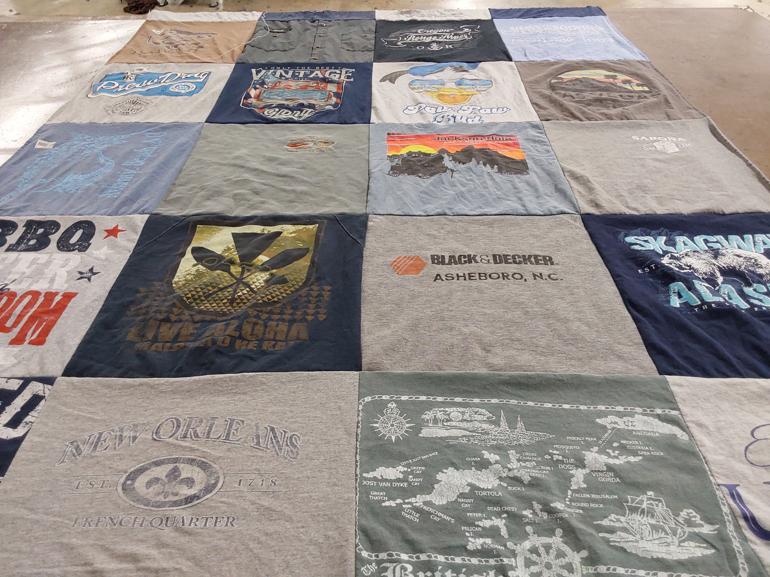T-shirt quilt with travel, outdoor themes by Amanda from NC