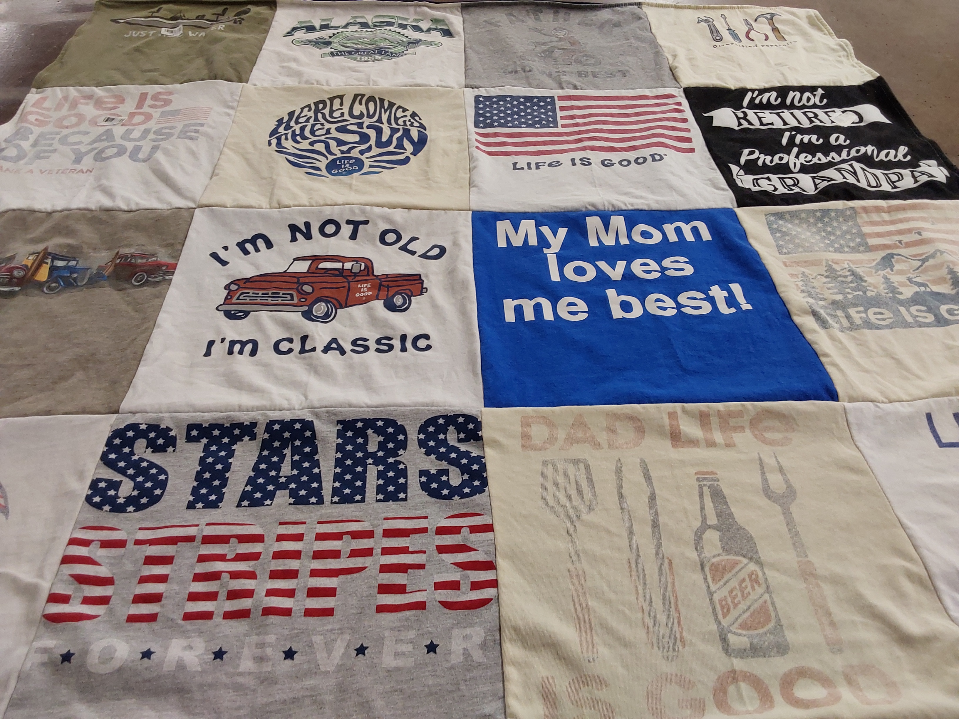 T-shirt quilt with outdoor activities, family themes by Genelle from CA